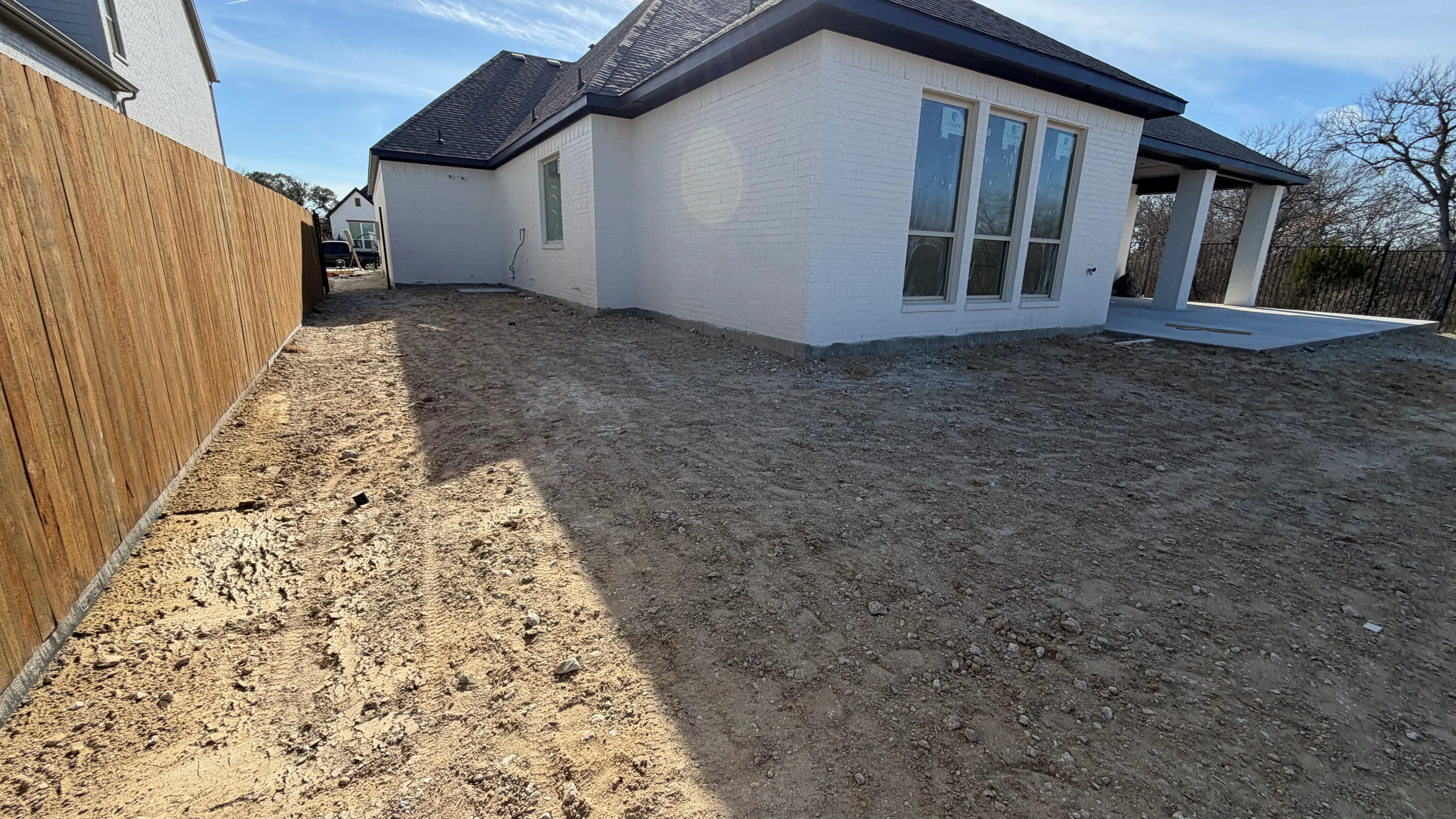 Before 2 — Parks of Aledo new build with Jobe Homes: a high-end greenbelt backyard built to enjoy, not maintain