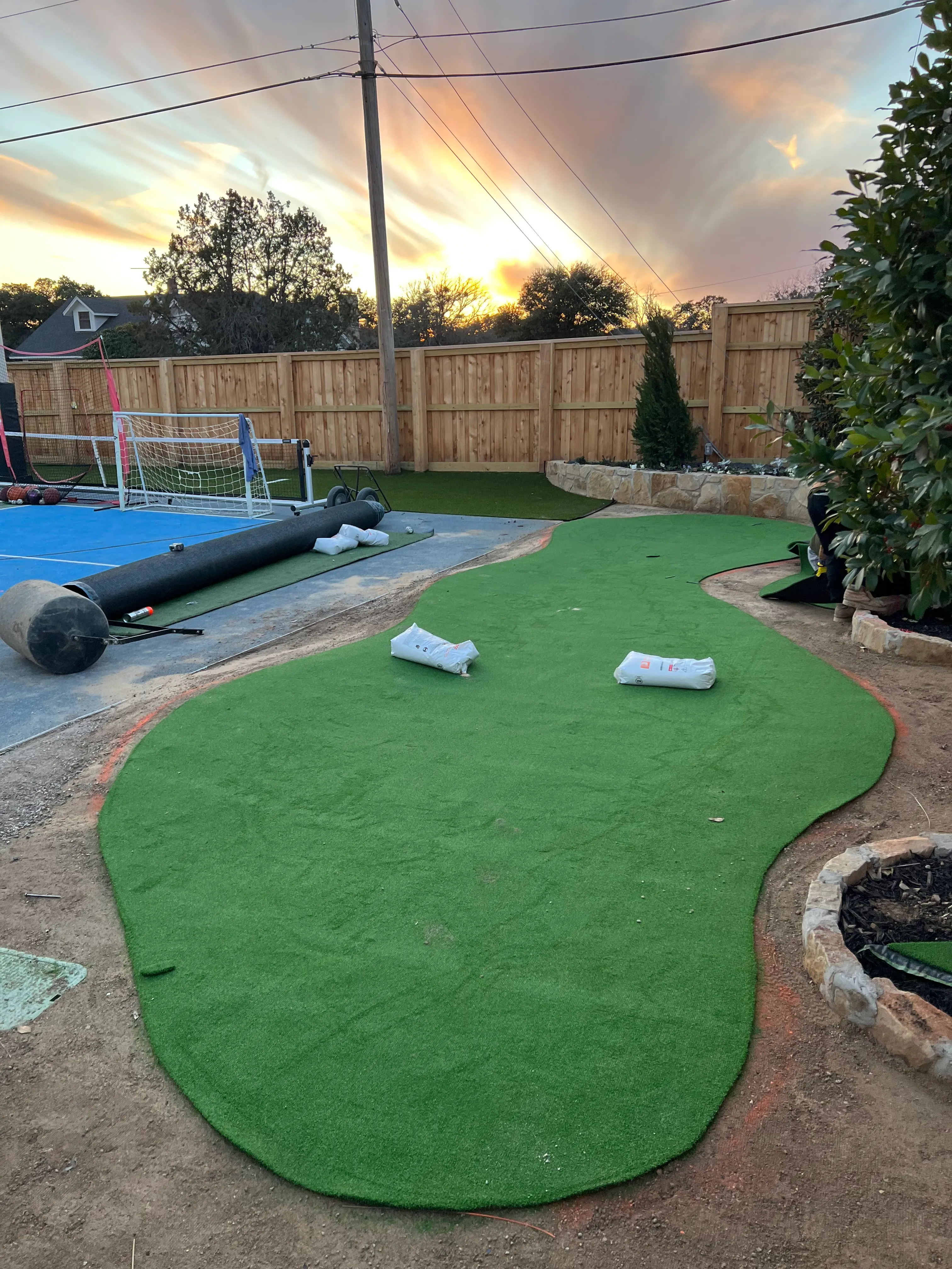 Construction 1 — Aledo Airbnb-Ready Backyard — 3,000 SF Turf + Putting Green