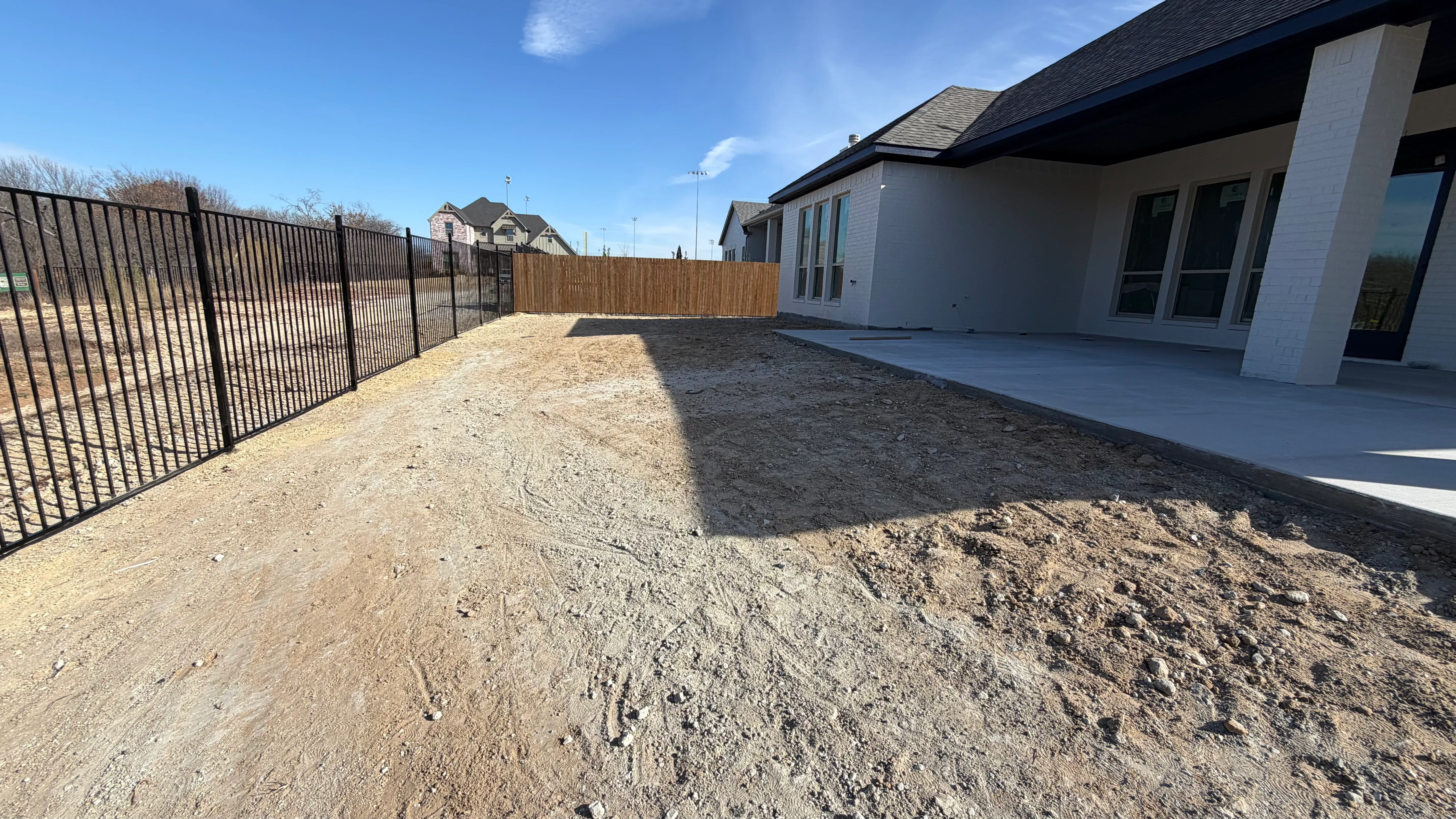 Before 3 — Parks of Aledo new build with Jobe Homes: a high-end greenbelt backyard built to enjoy, not maintain