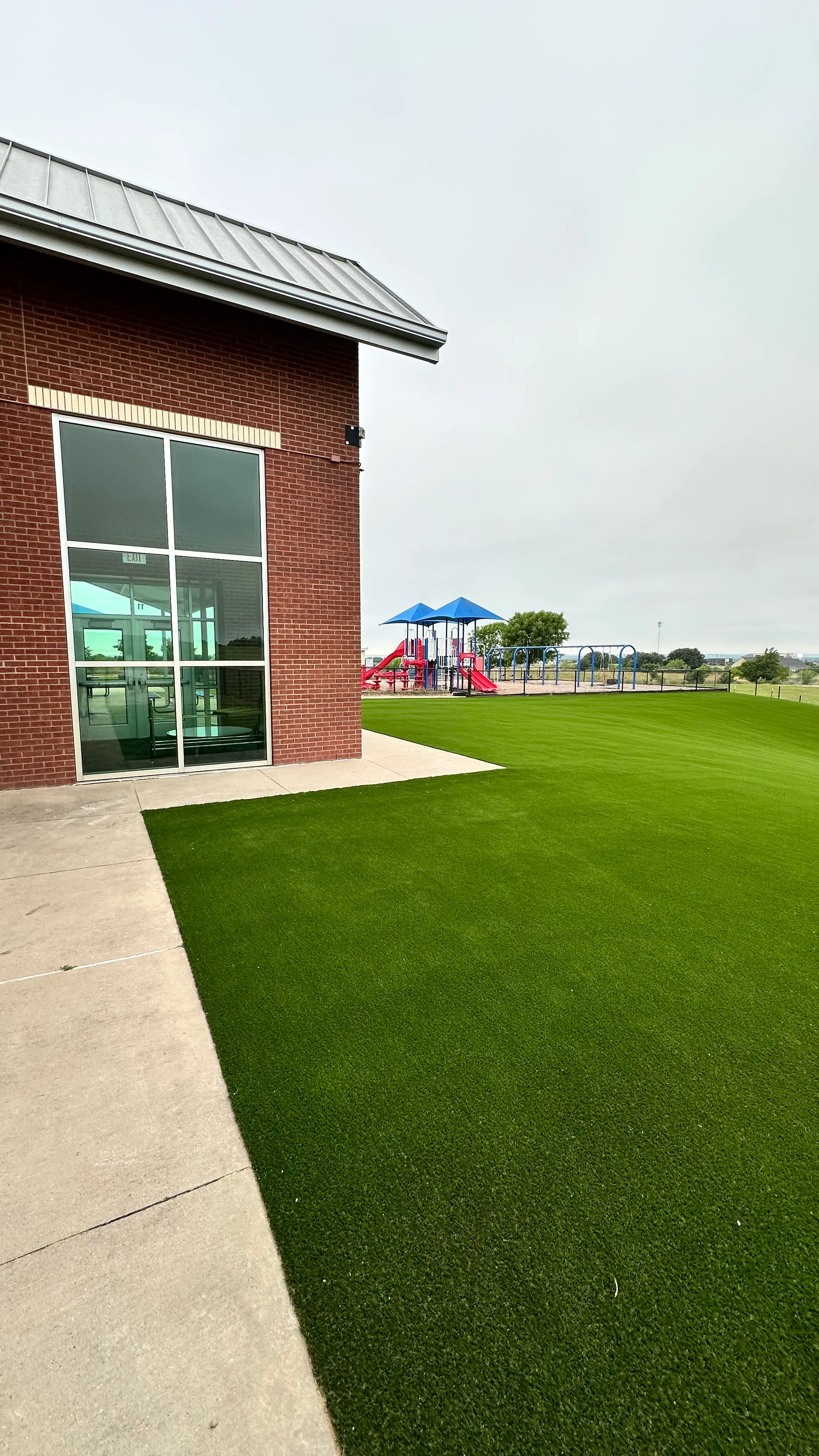 Bearcat artificial turf backyard install in Willow Park, TX (photo 18)