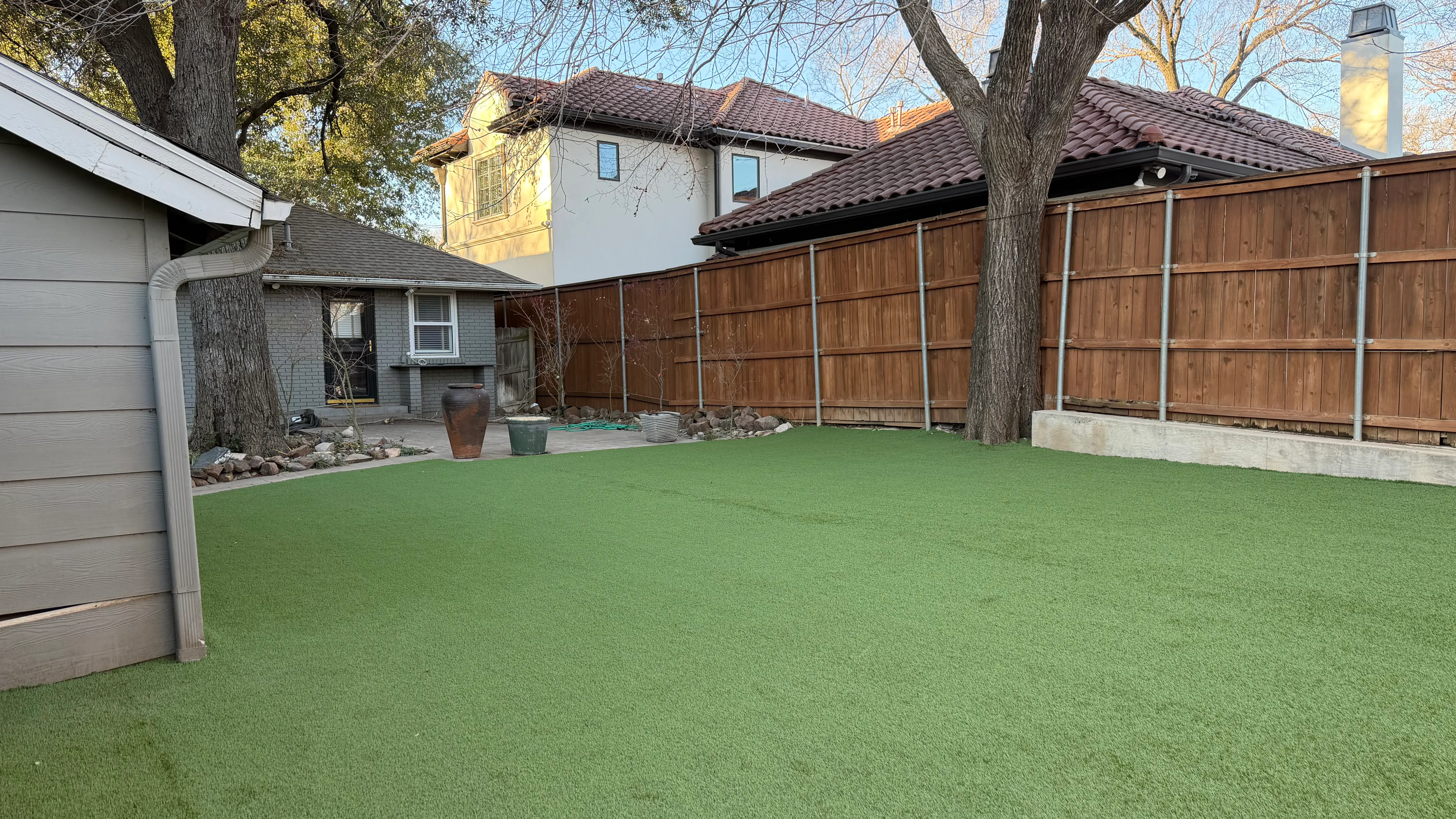 After 12 — Monticello front yard: 2,200 SF of turf under a mature Fort Worth tree canopy