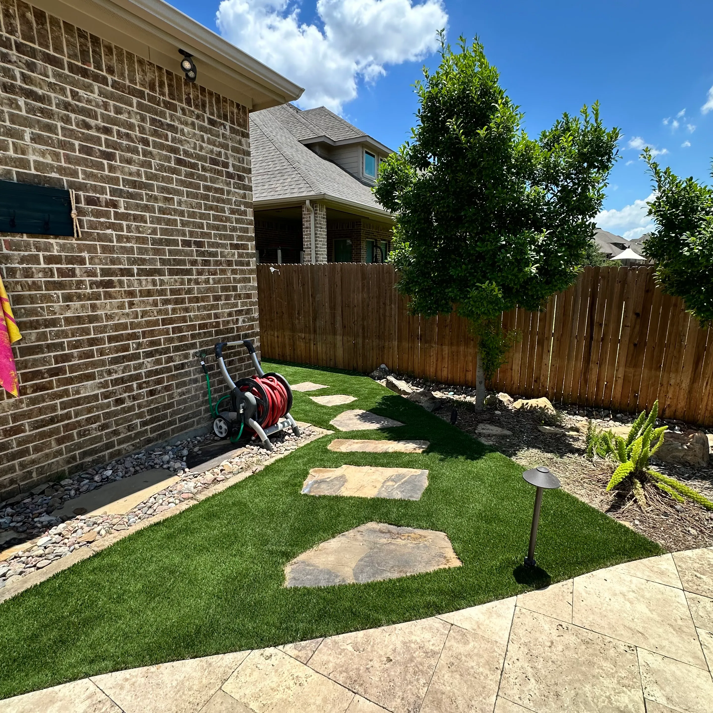 Bearcat artificial turf backyard install in Keller, TX (photo 11)
