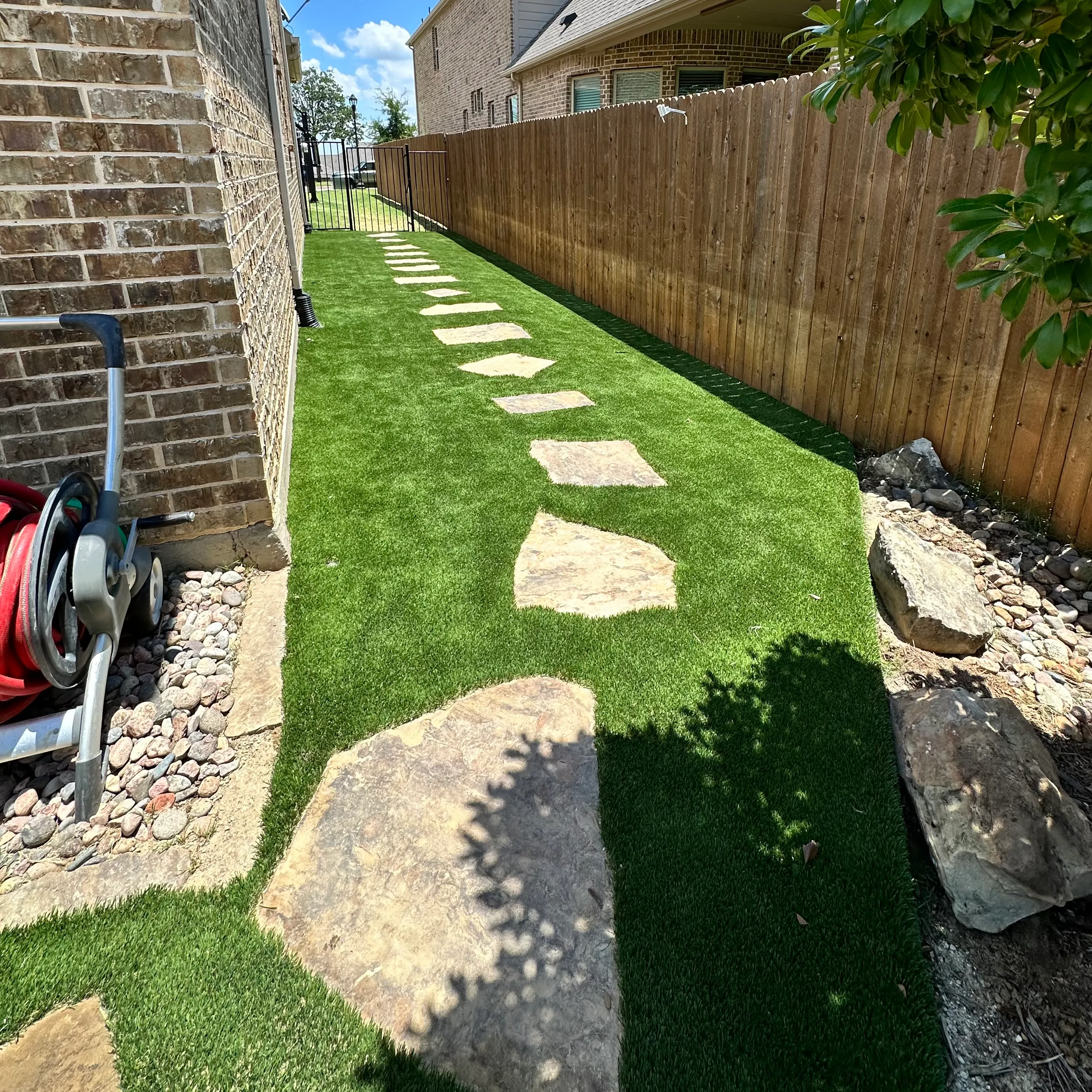 Bearcat artificial turf backyard install in Keller, TX (photo 12)