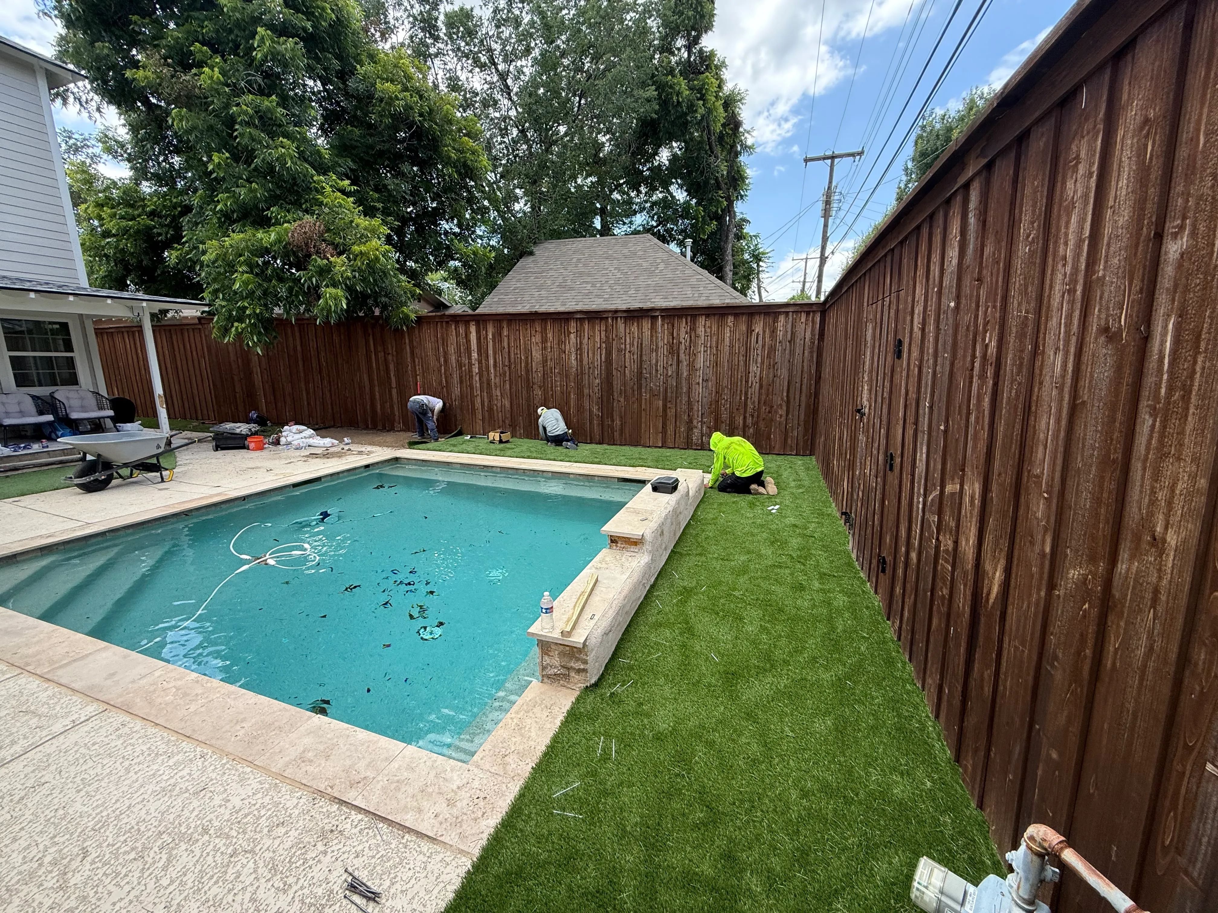 Construction 1 — Monticello backyard: rocks out, Malibu 80 in — a Tudor glow-up off Camp Bowie
