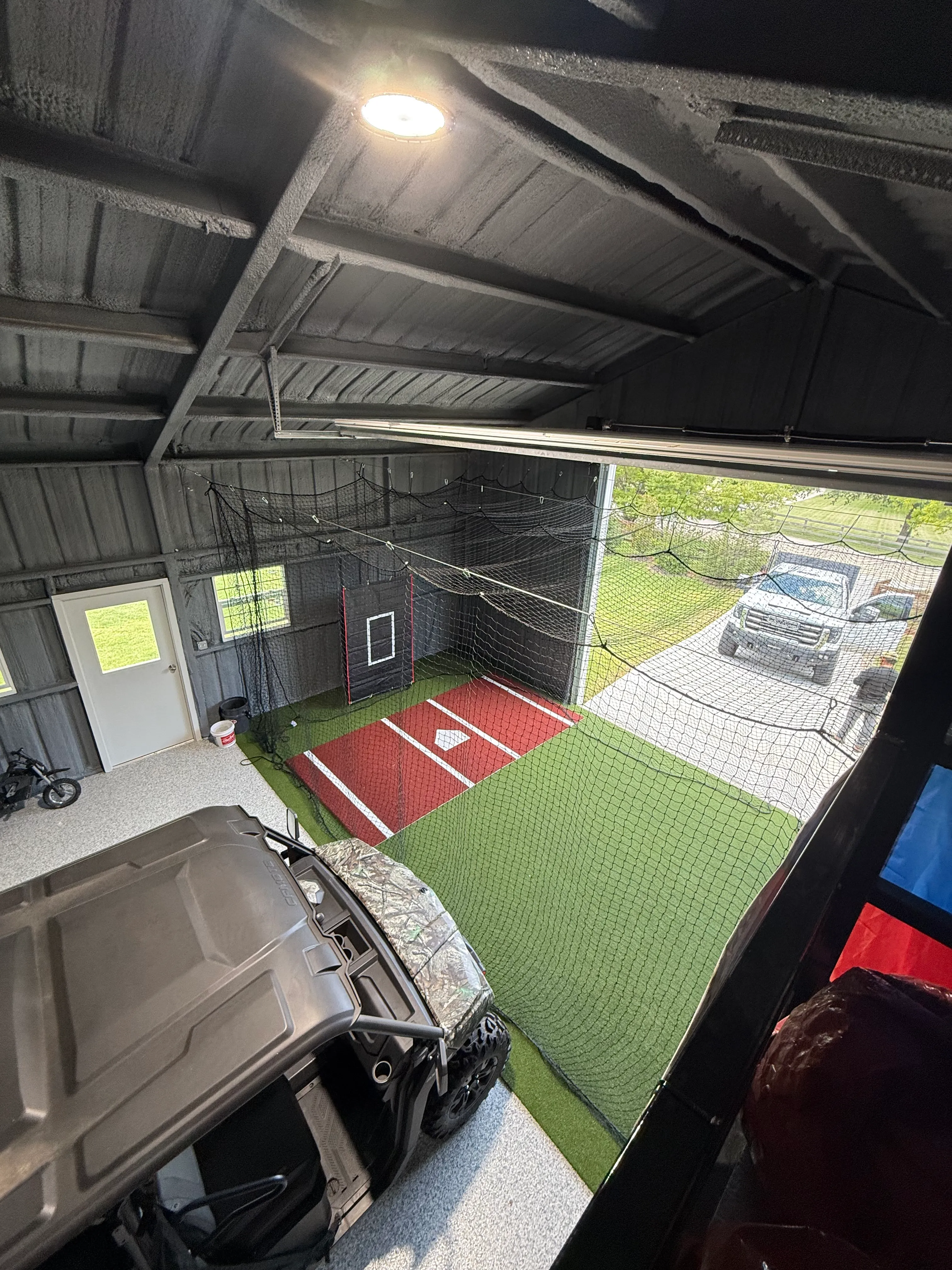 Argyle barn batting cage: Cimarron nets hung from the rafters, Performance Pro turf, barn still works feature 3