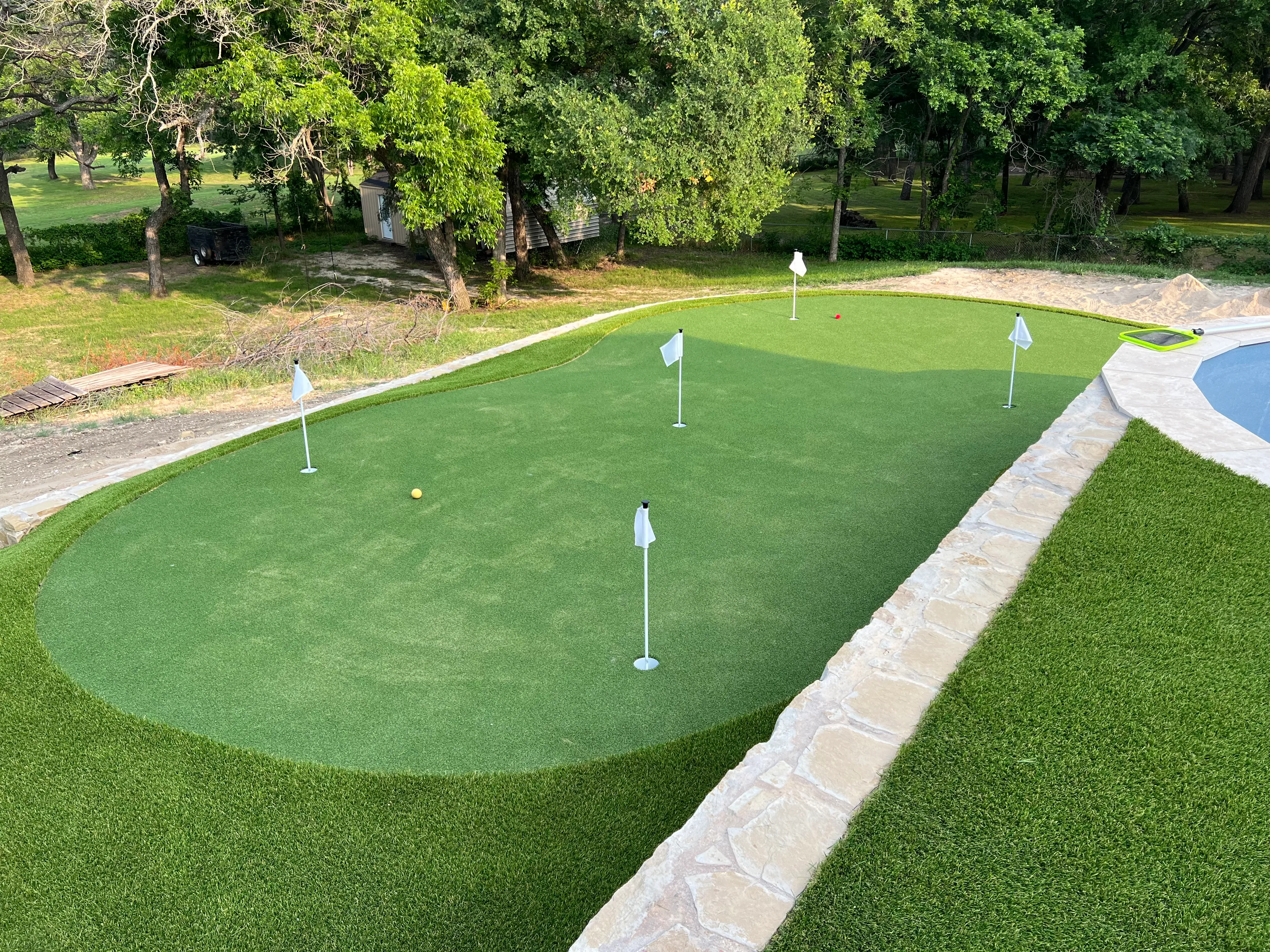 After 7 — Willow Park Multi-Level Putting Green & Pool Surround — On a Golf Course