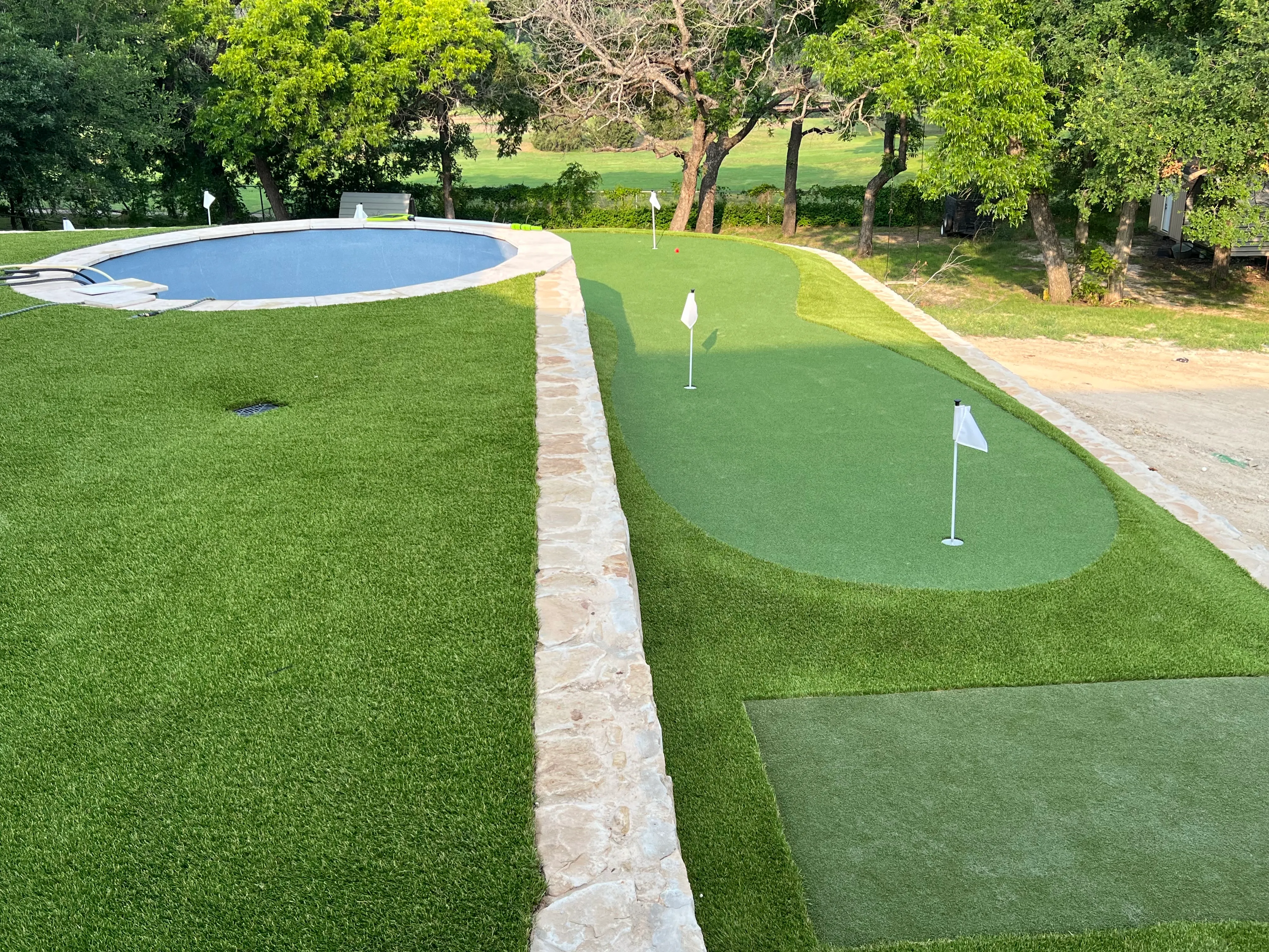 After 8 — Willow Park Multi-Level Putting Green & Pool Surround — On a Golf Course