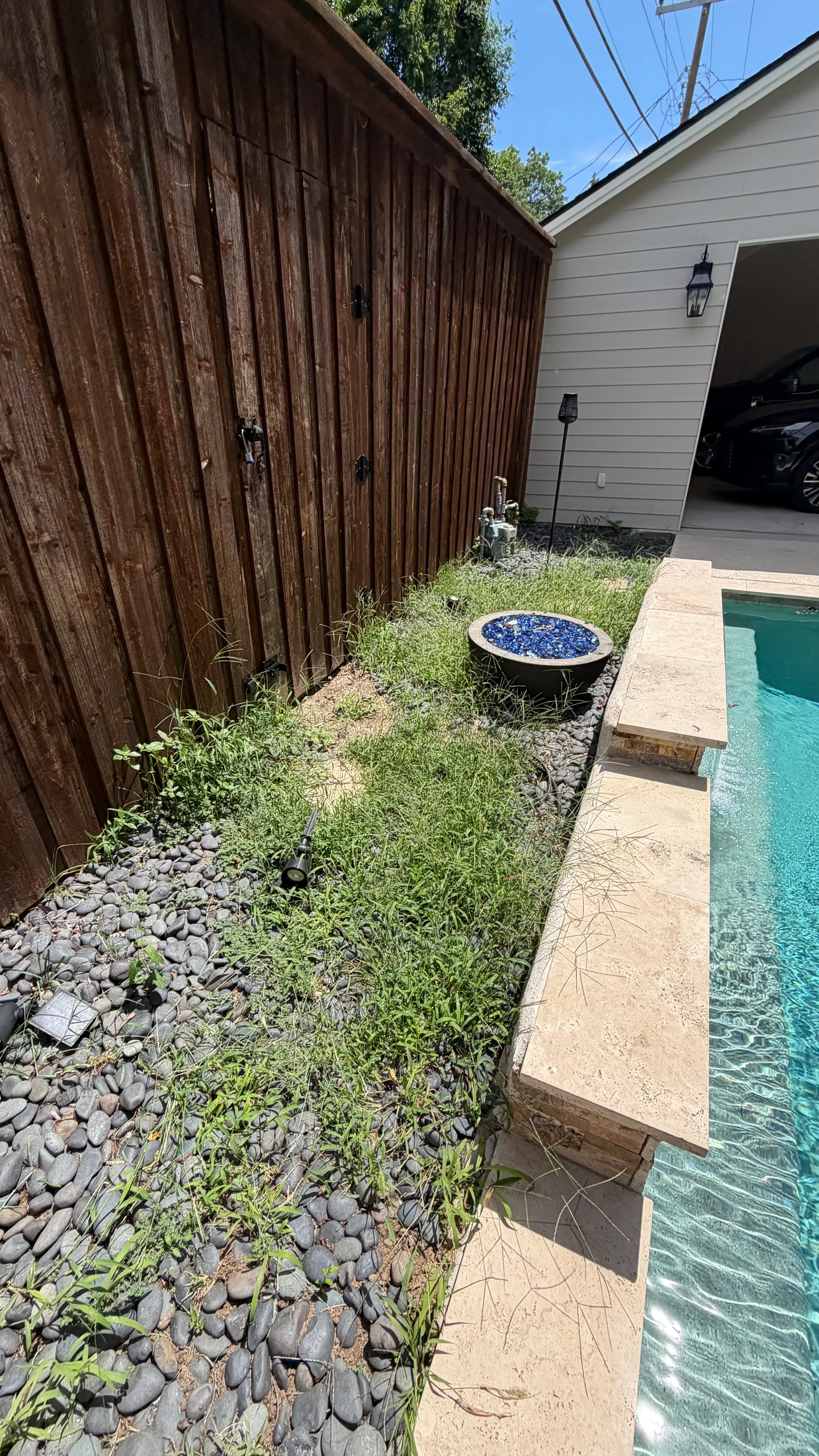 Before 2 — Monticello backyard: rocks out, Malibu 80 in — a Tudor glow-up off Camp Bowie