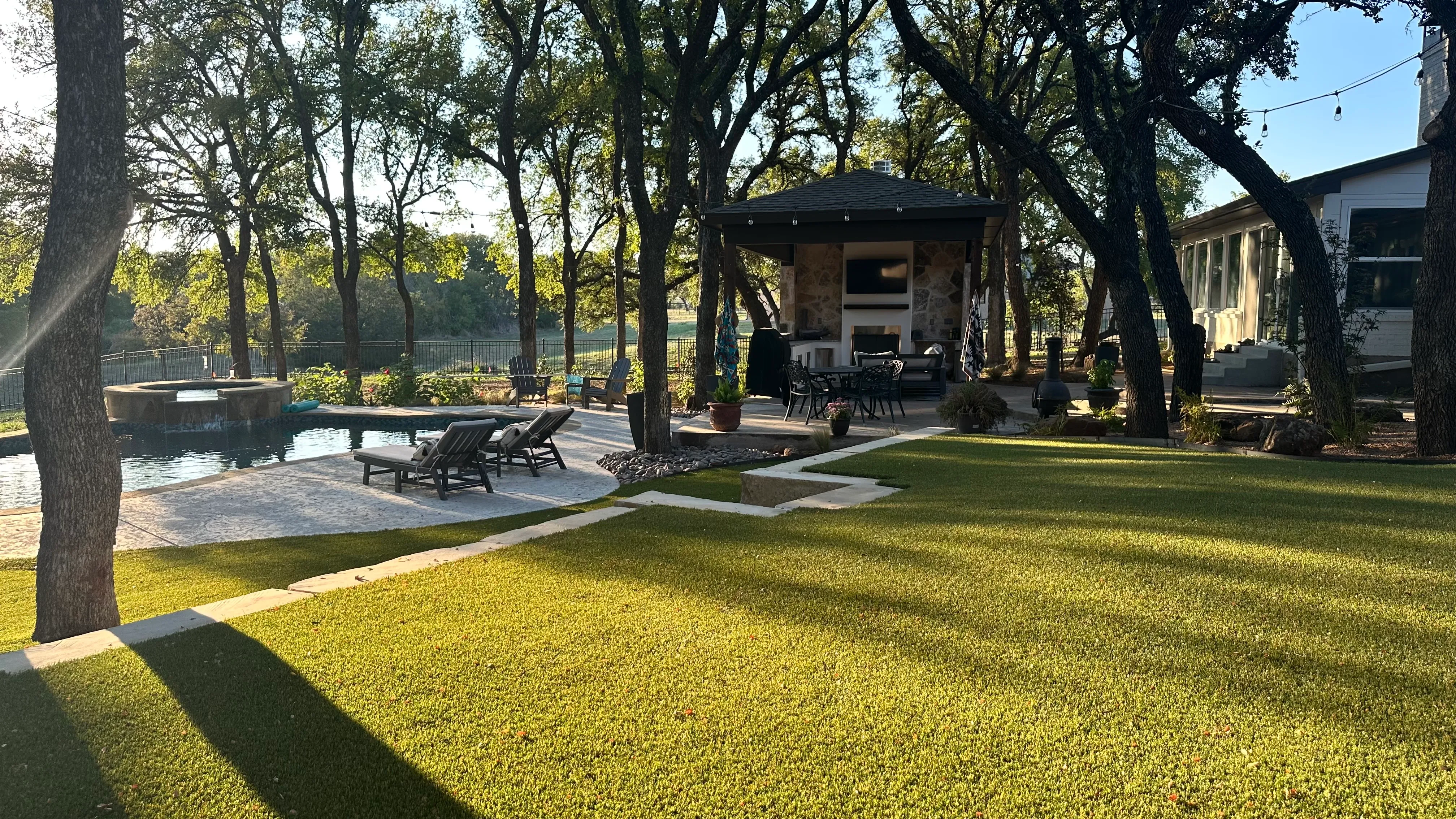 Bearcat artificial turf backyard install in Willow Park, TX (photo 23)