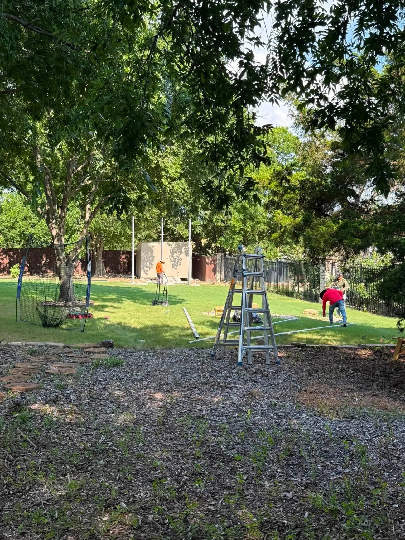 Construction 3 — Allen backyard batting cage: Cimarron 55x12x12 net on steel posts, crushed-concrete base, clay batter's box