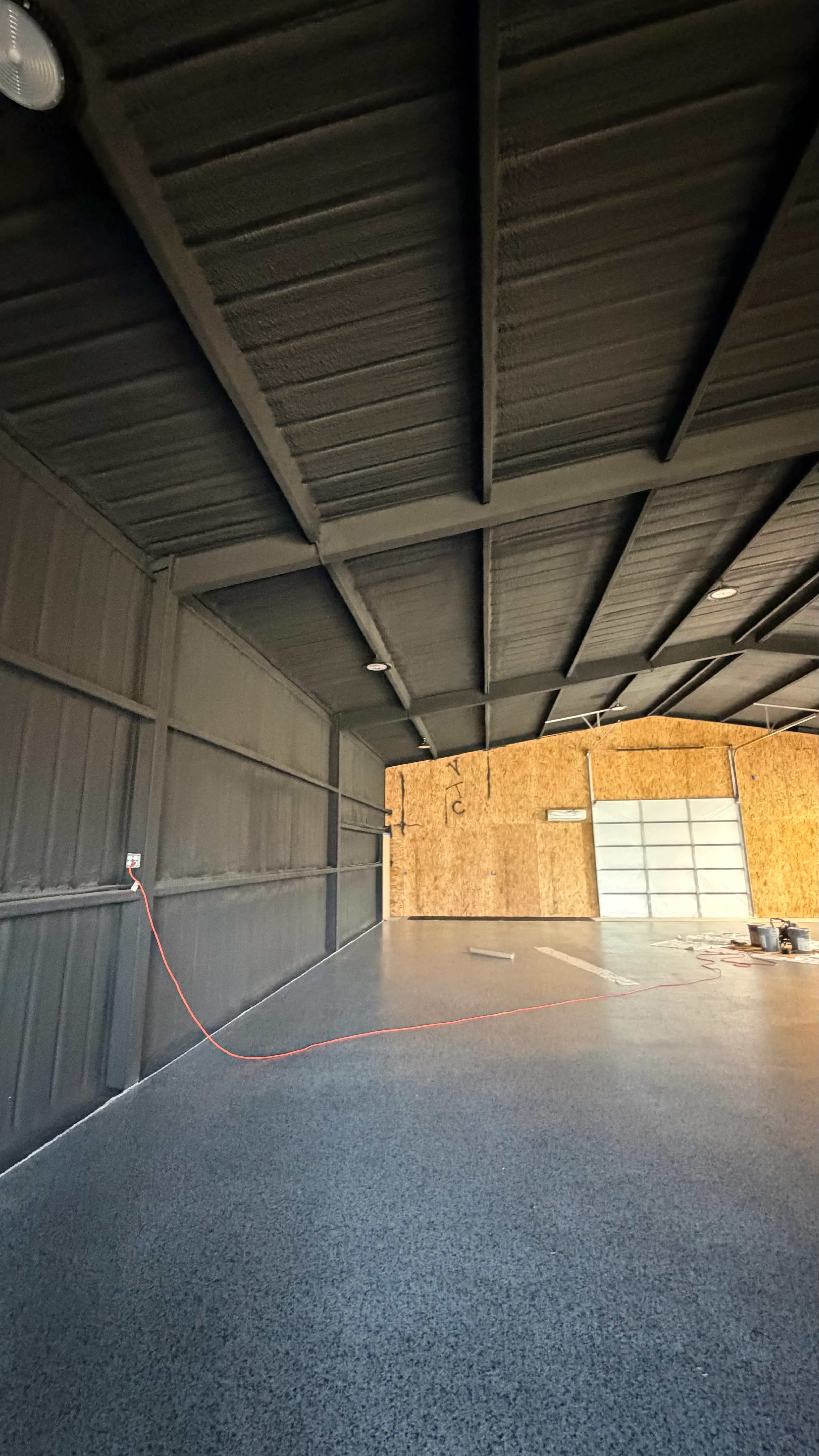 Aledo backyard barn batting cage: 70' full-length retractable Cimarron net, Performance Pro turf, clay batter's box — before