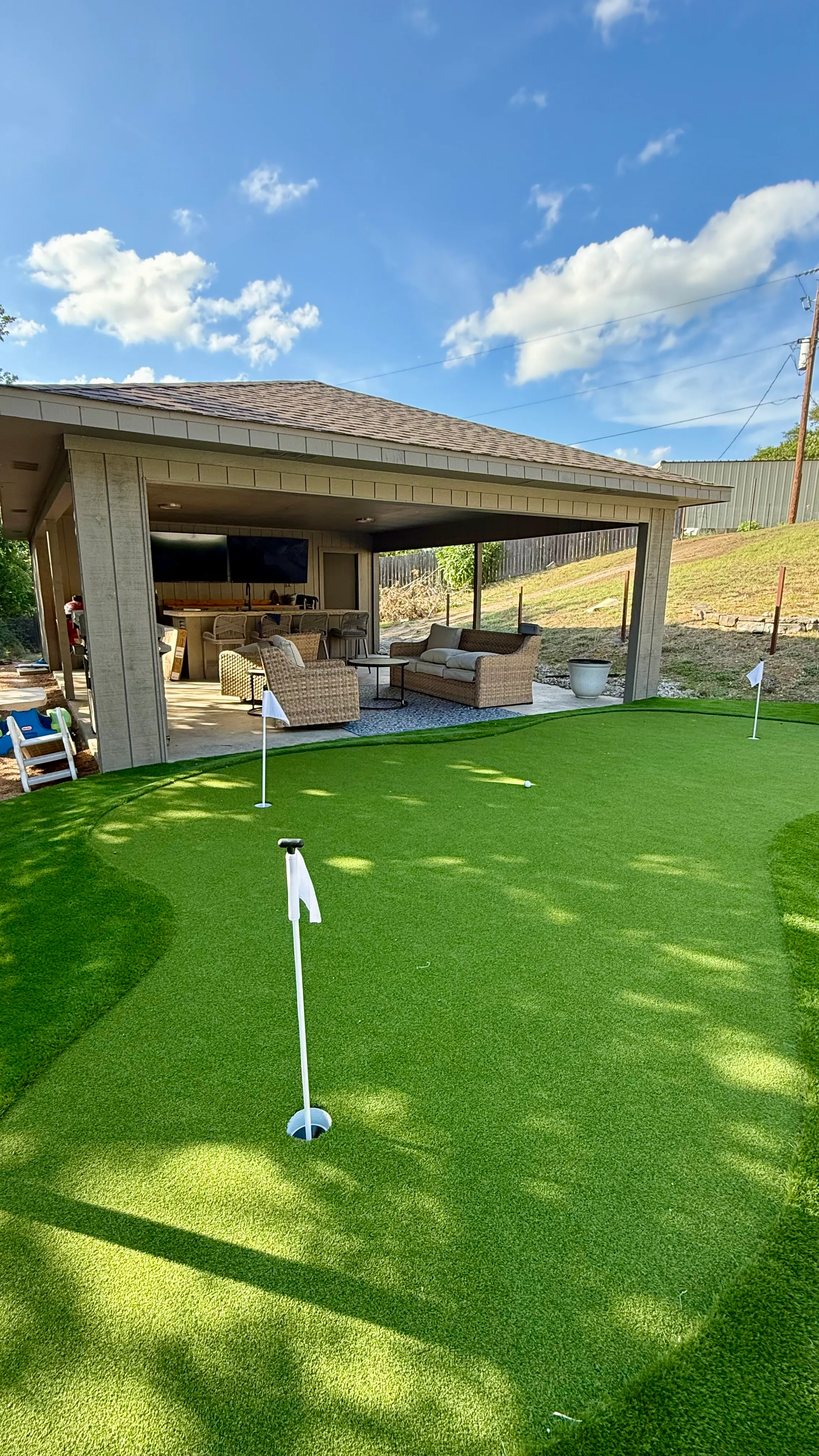 Bearcat artificial turf backyard install in Willow Park, TX (photo 32)