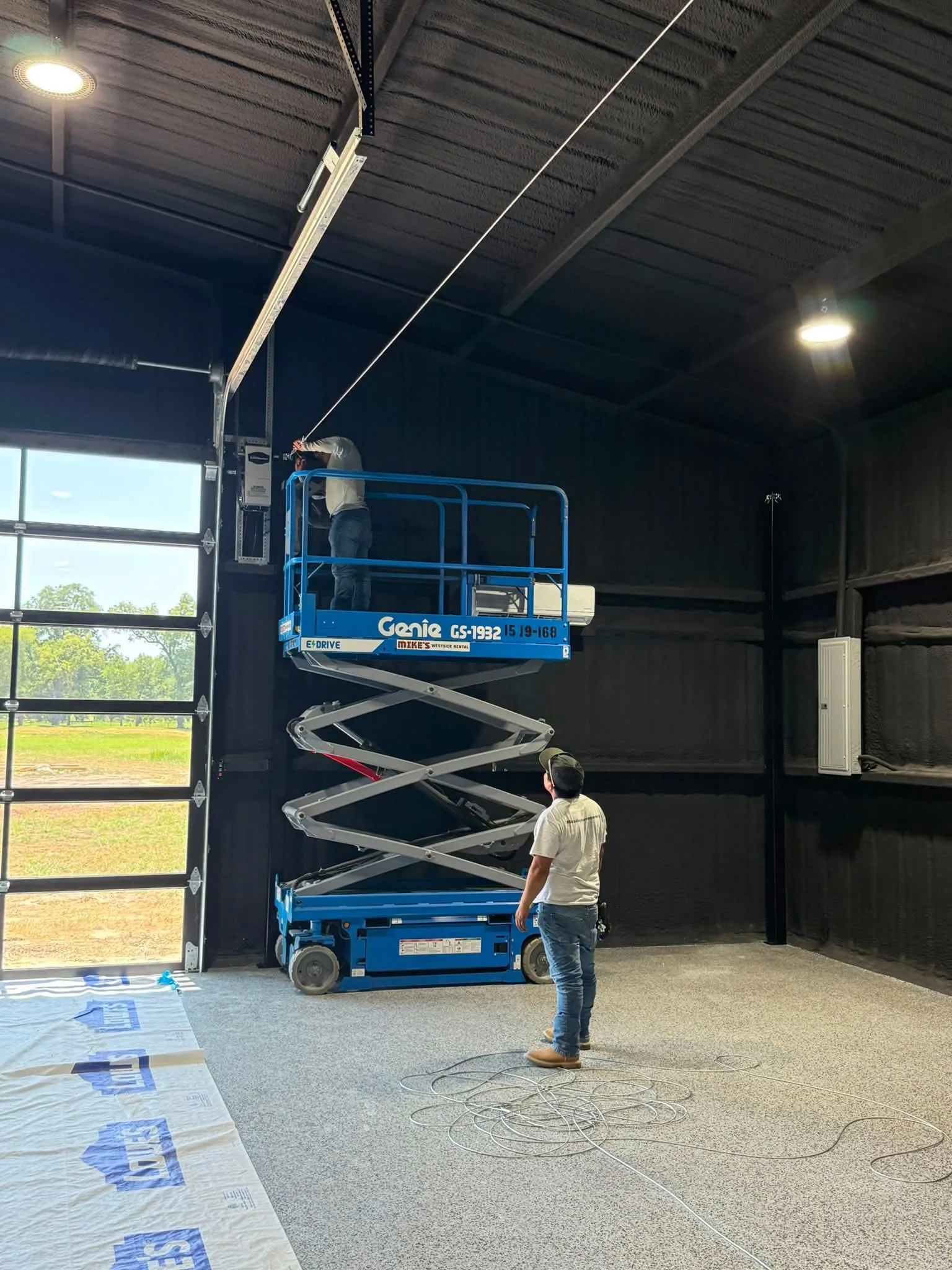Construction 1 — Aledo backyard barn batting cage: 70' full-length retractable Cimarron net, Performance Pro turf, clay batter's box