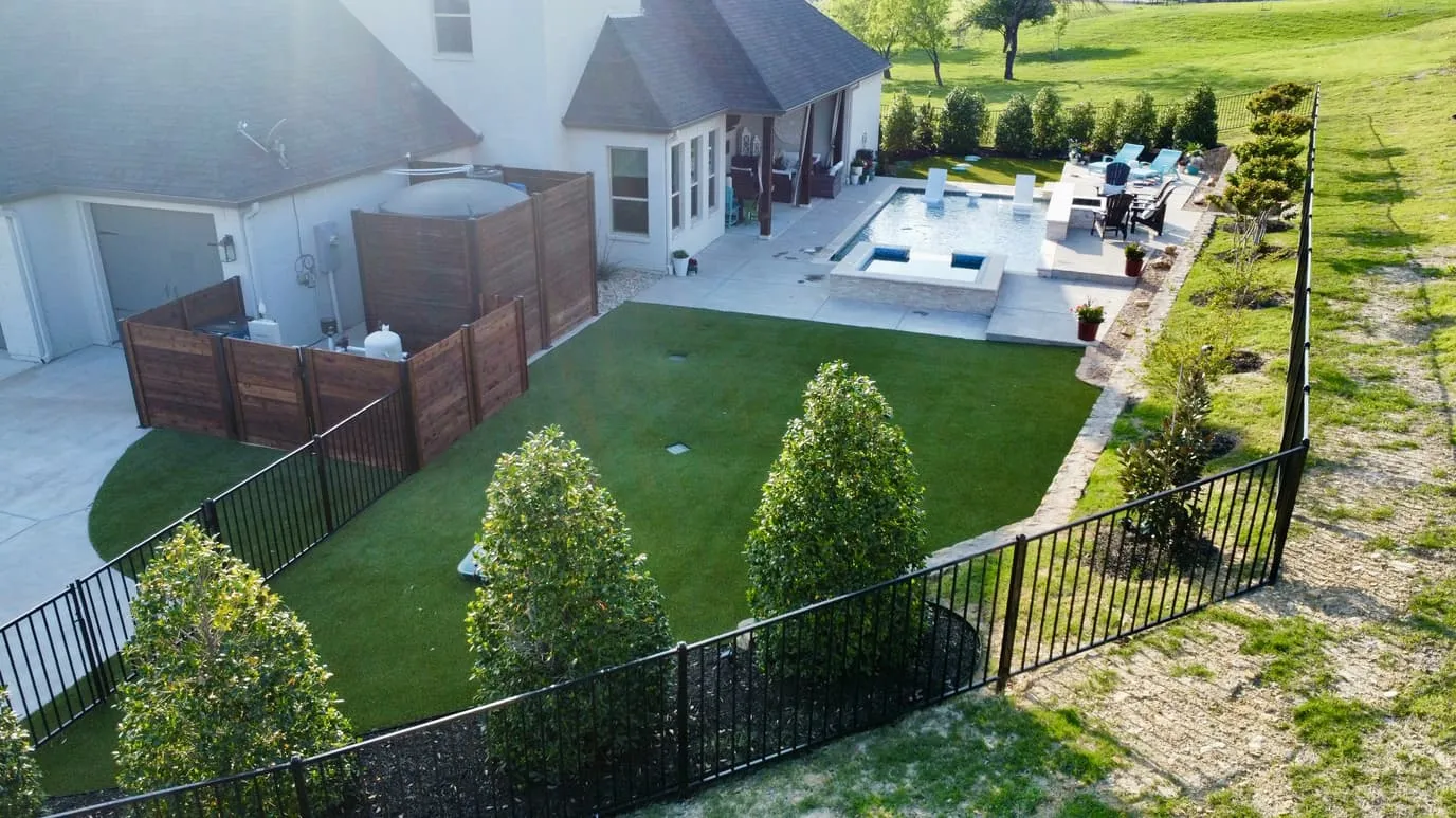 Aerial backyard pool with artificial turf in DFW