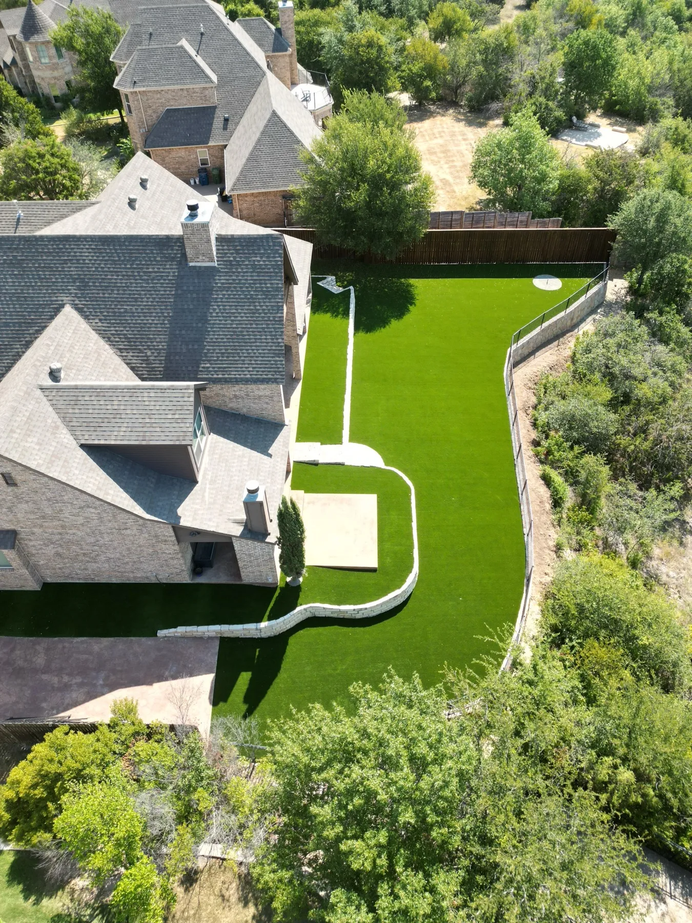 Overhead aerial of backyard artificial turf lawn in Aledo TX