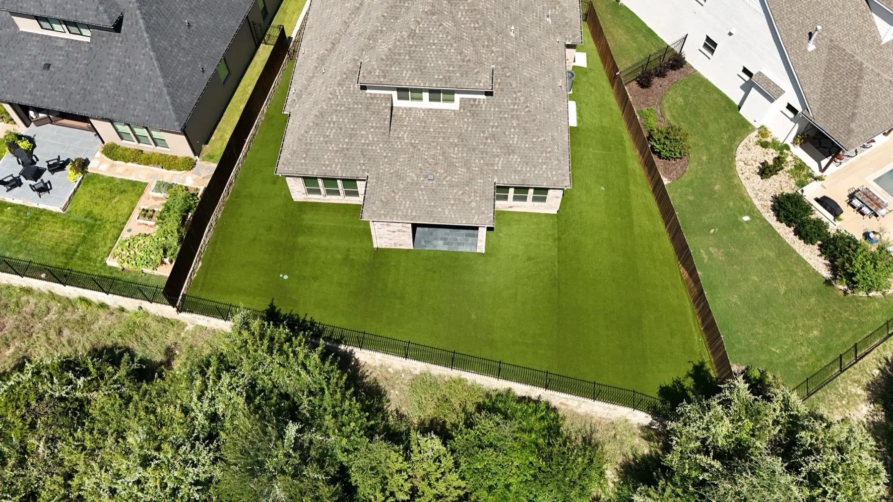 Aerial Aledo TX backyard artificial turf install detail