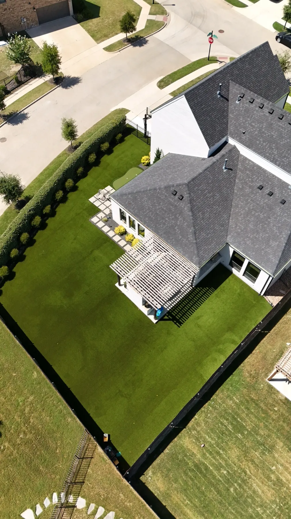Aerial Aledo TX backyard turf with landscaping