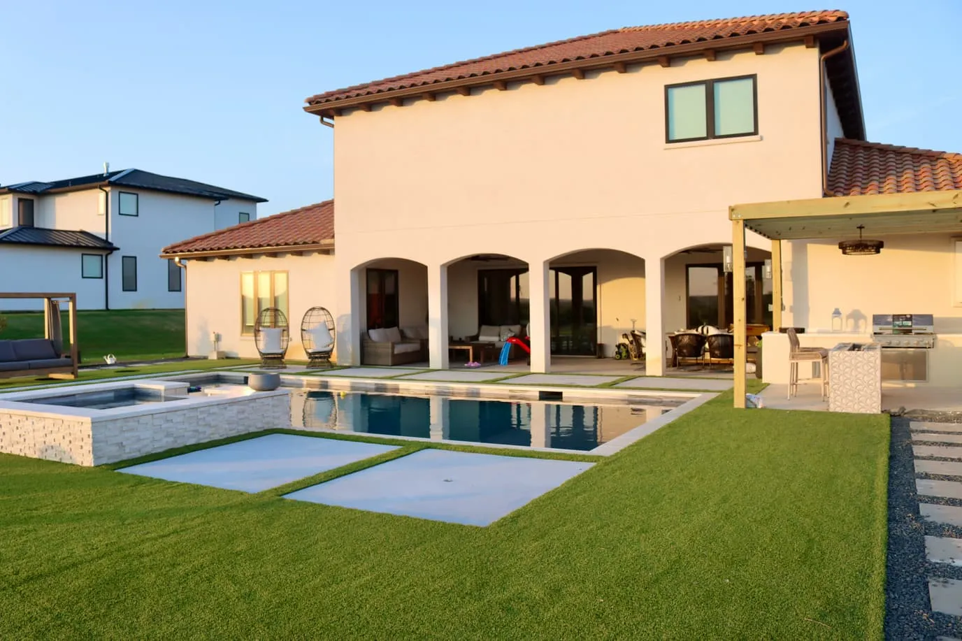 Artificial putting green with flags and practice balls