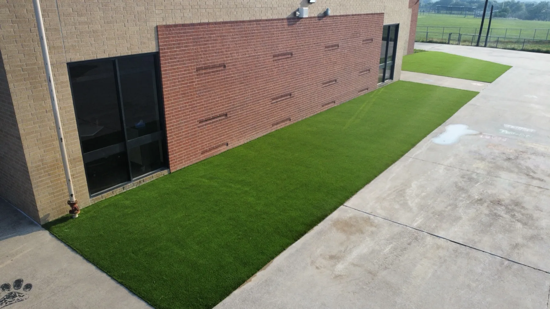 School athletic field artificial turf installation