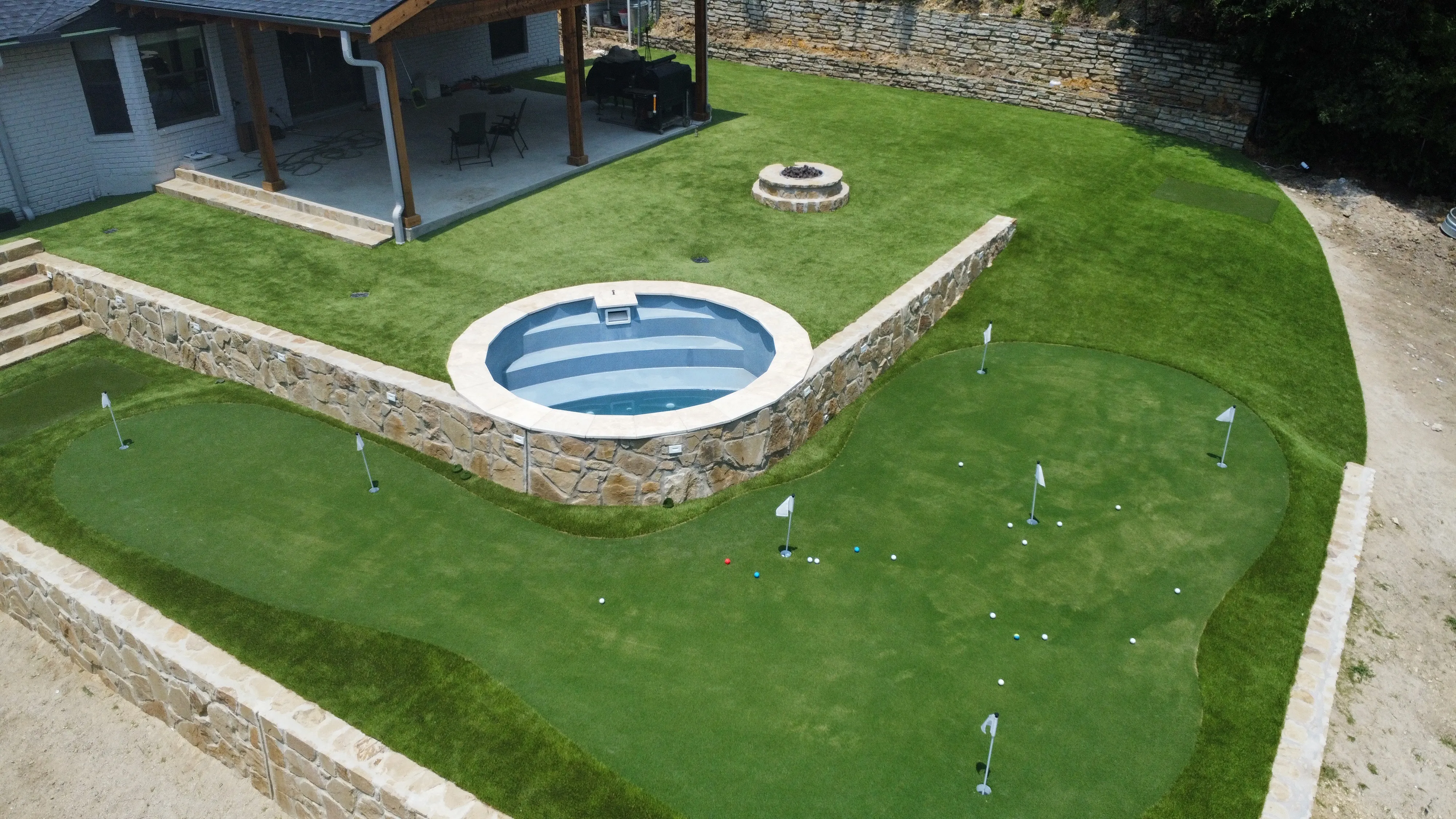 Willow Park Multi-Level Putting Green & Pool Surround — On a Golf Course feature 3