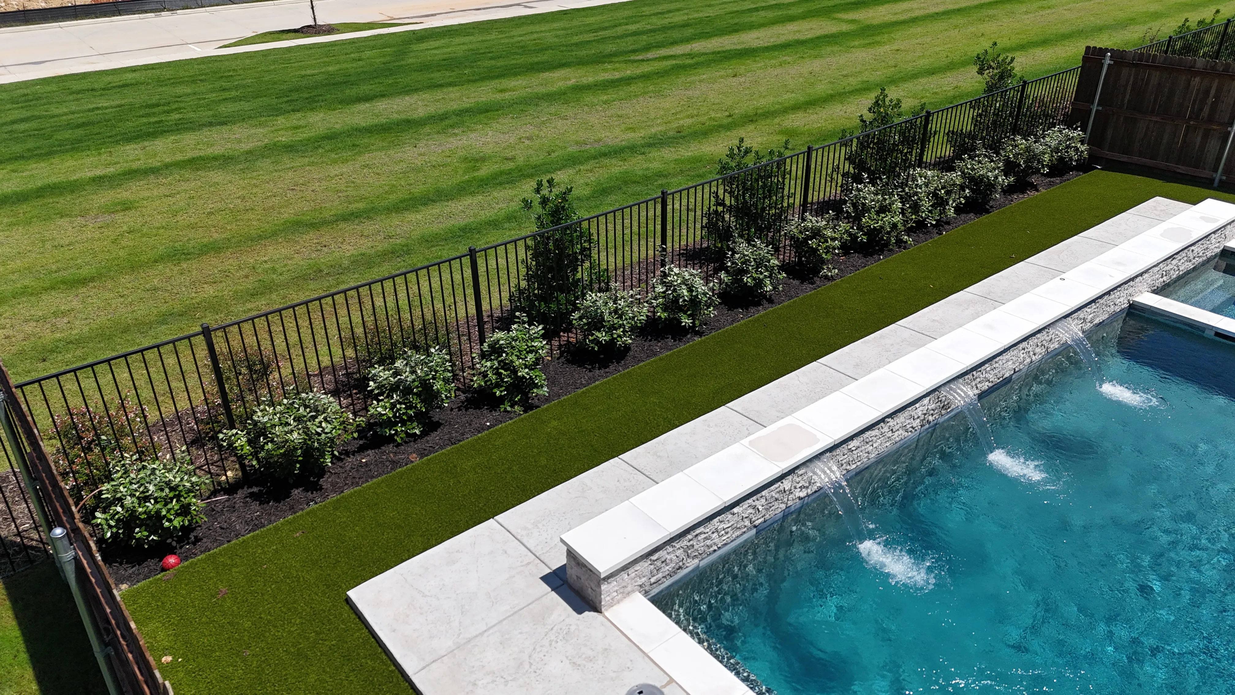 After 4 — Complete backyard upgrade in a DFW master-planned community: 700 SF turf, privacy bushes, fence-line flower bed