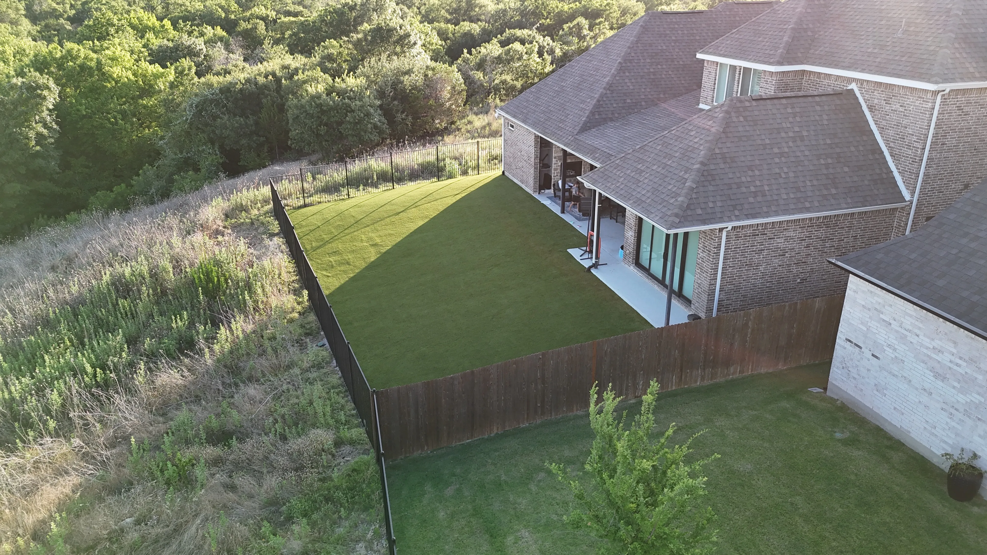 Aerial 2 — Parks of Aledo full backyard: 2,900 SF of Rymar TriBlend that disappears into the greenbelt