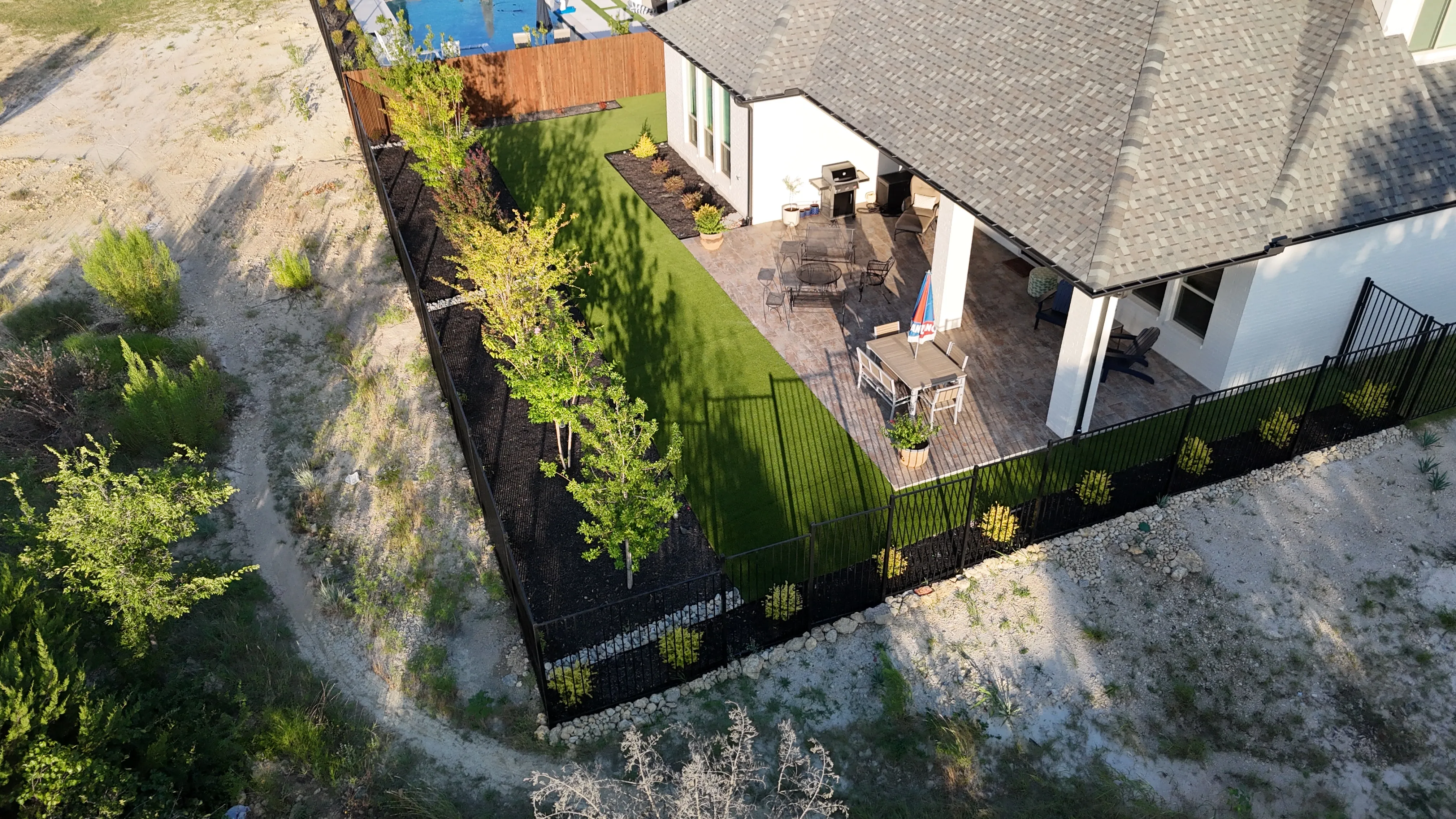 Parks of Aledo new build with Jobe Homes: a high-end greenbelt backyard built to enjoy, not maintain feature 3