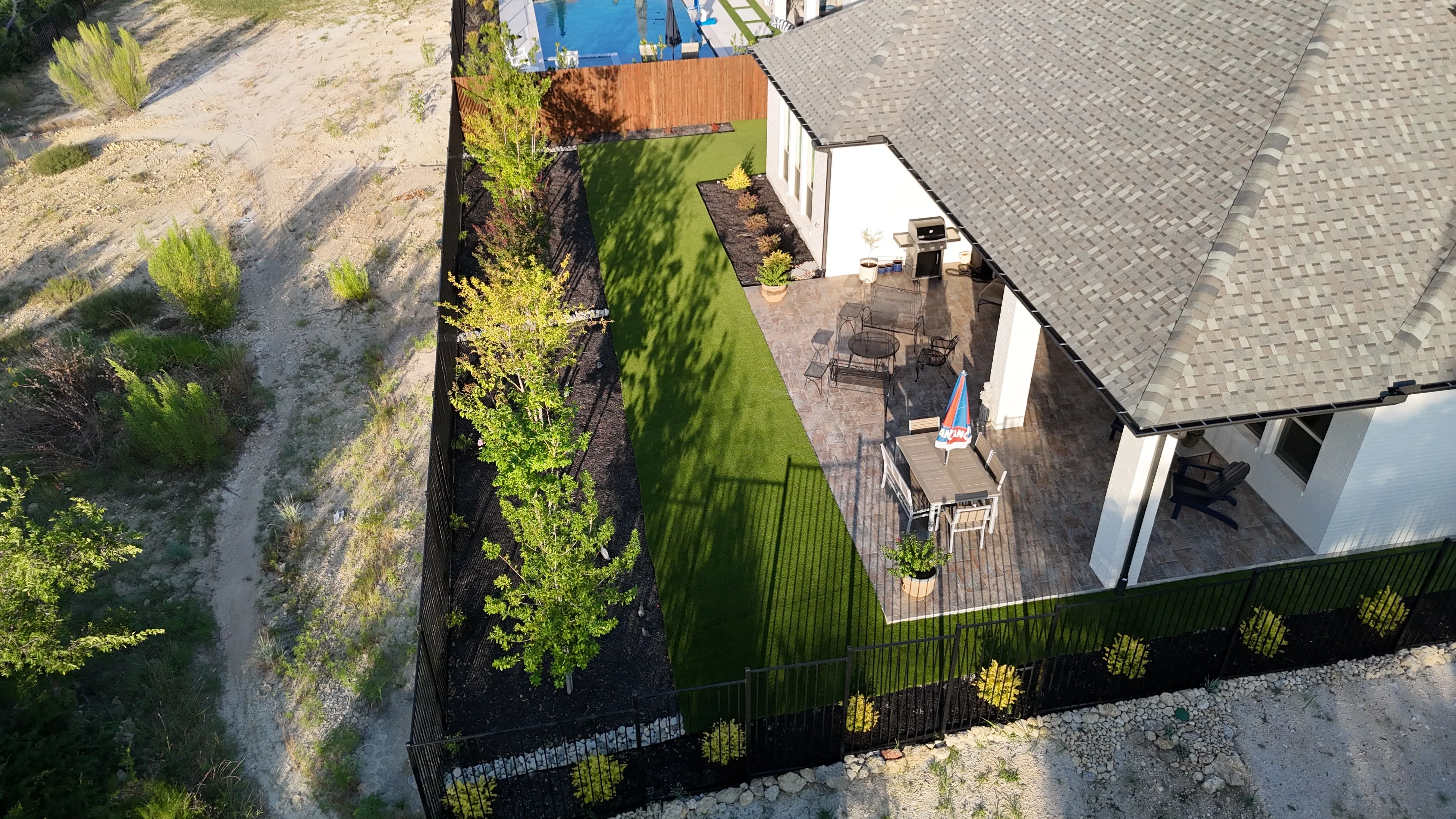 Aerial 1 — Parks of Aledo new build with Jobe Homes: a high-end greenbelt backyard built to enjoy, not maintain