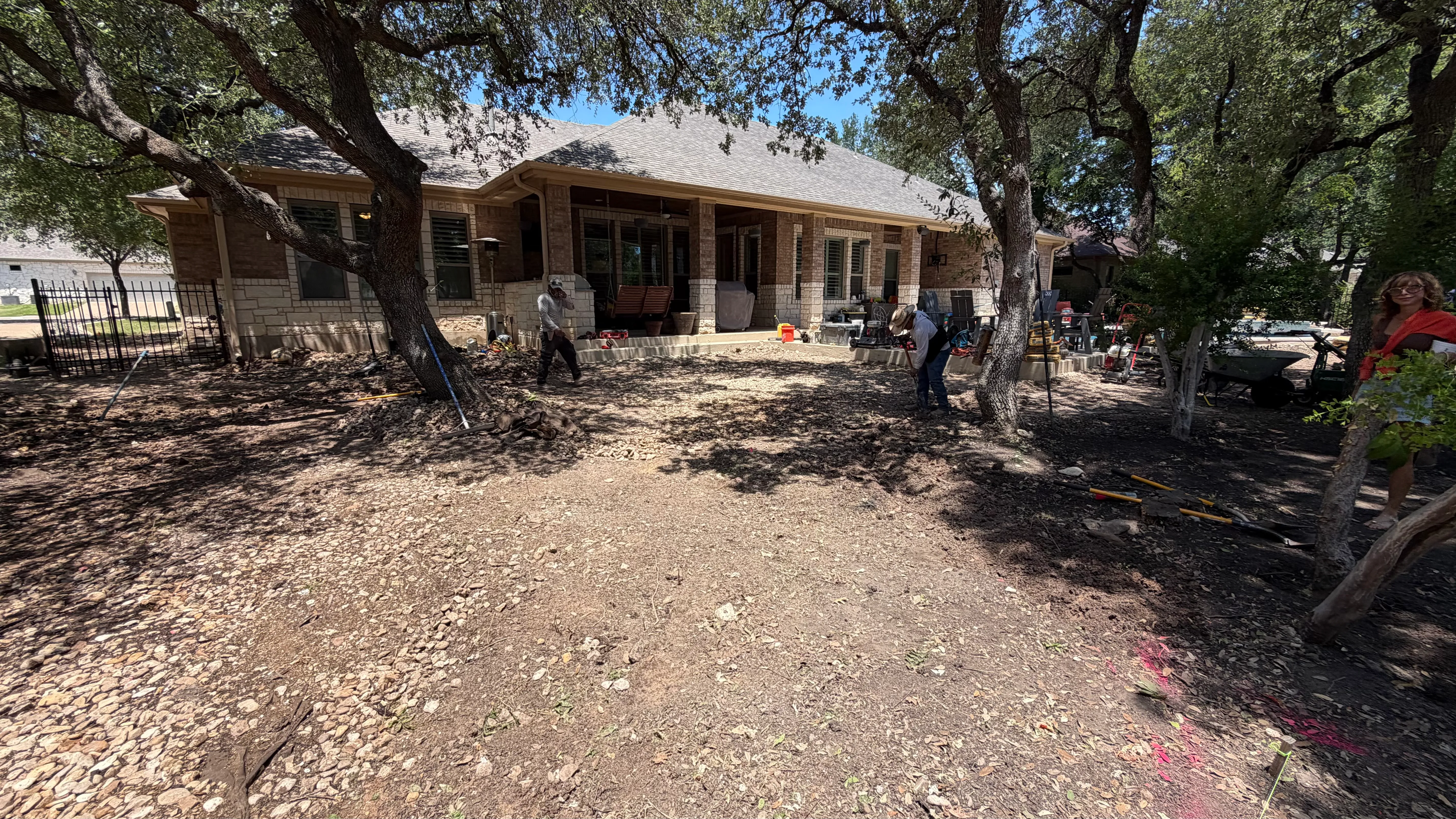 Before 4 — Georgetown complete backyard renovation: turf, limestone, and living space under the live oaks