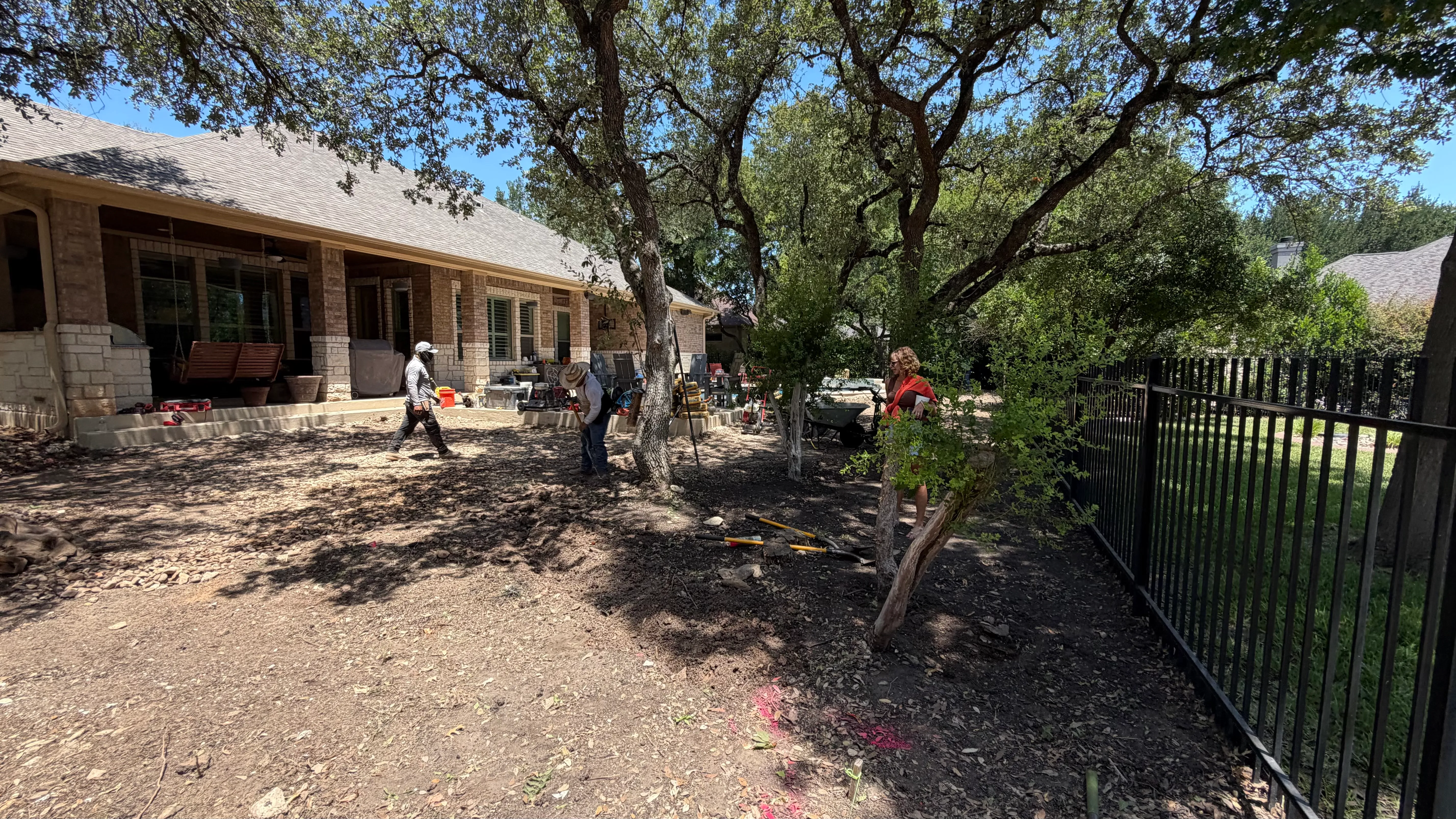 Before 5 — Georgetown complete backyard renovation: turf, limestone, and living space under the live oaks