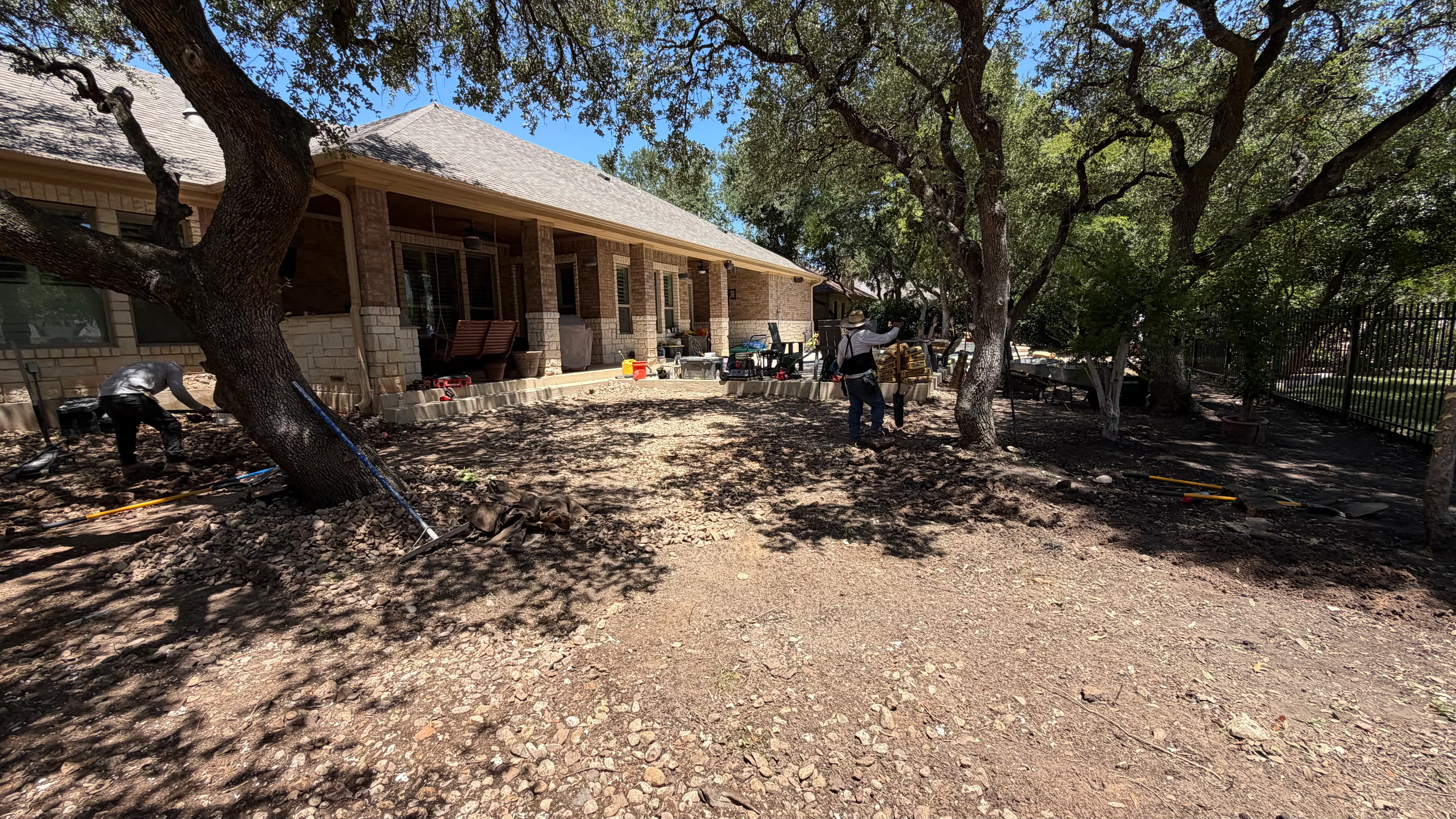 Before 6 — Georgetown complete backyard renovation: turf, limestone, and living space under the live oaks