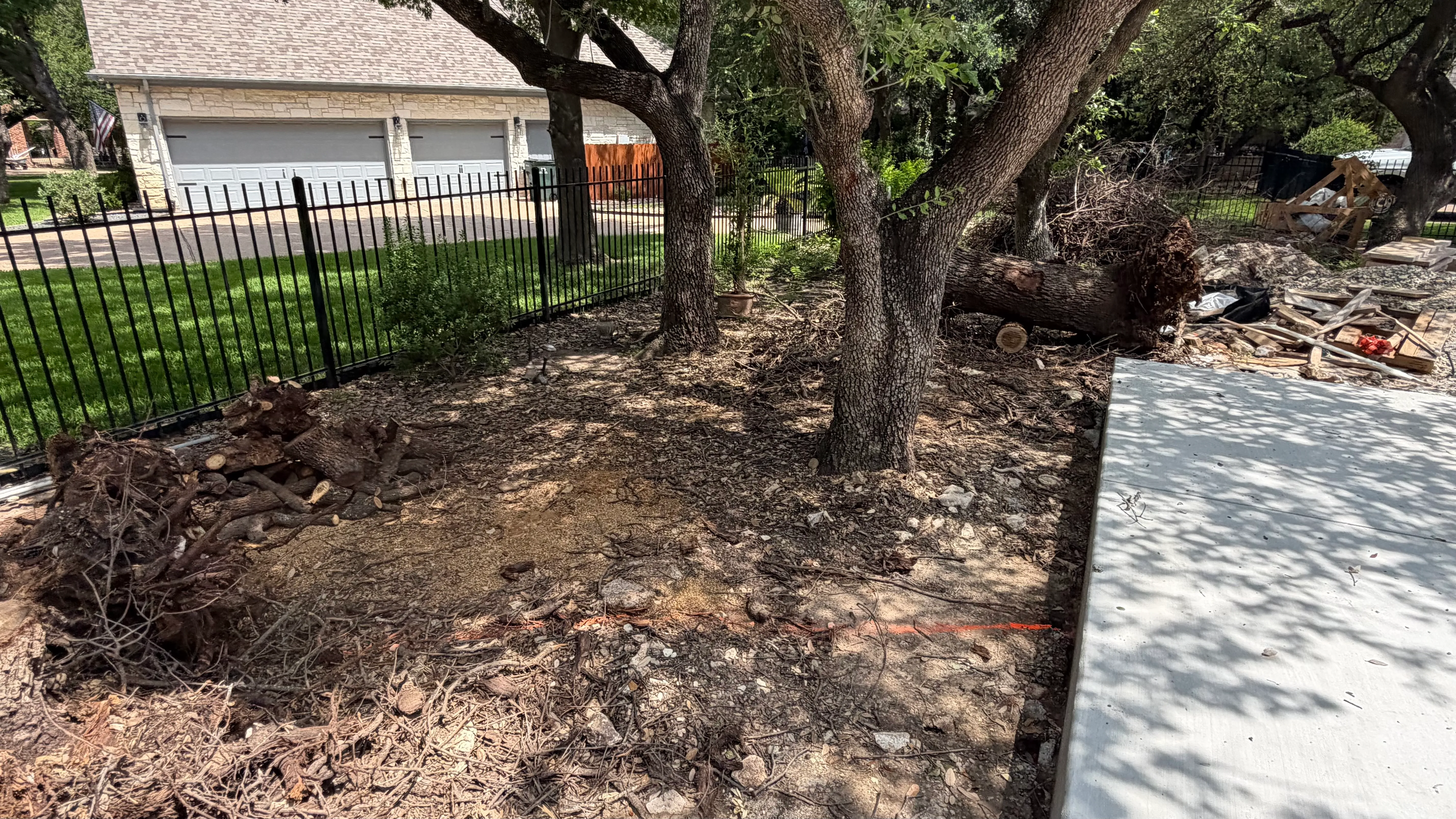 Before 9 — Georgetown complete backyard renovation: turf, limestone, and living space under the live oaks
