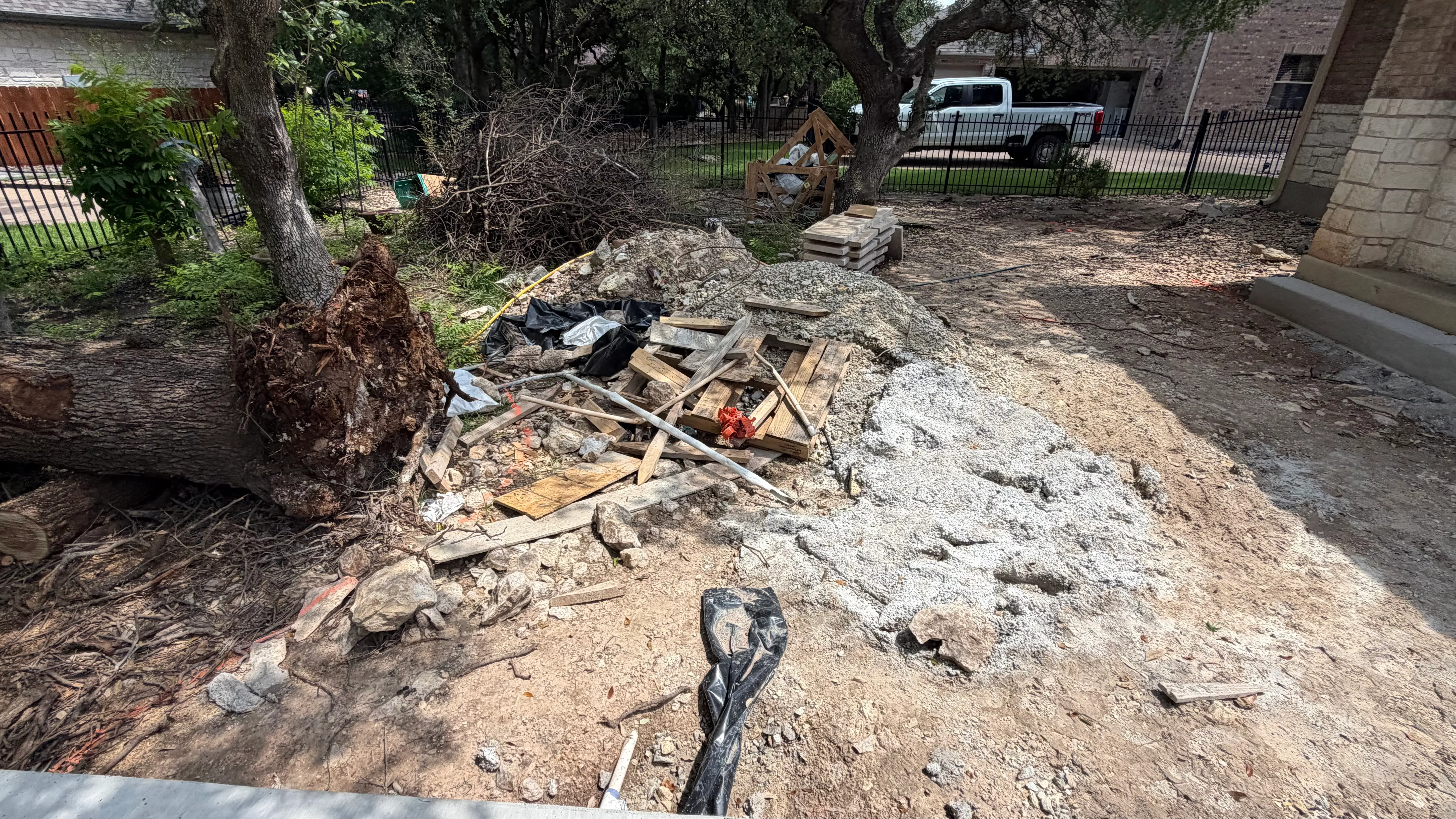 Before 10 — Georgetown complete backyard renovation: turf, limestone, and living space under the live oaks