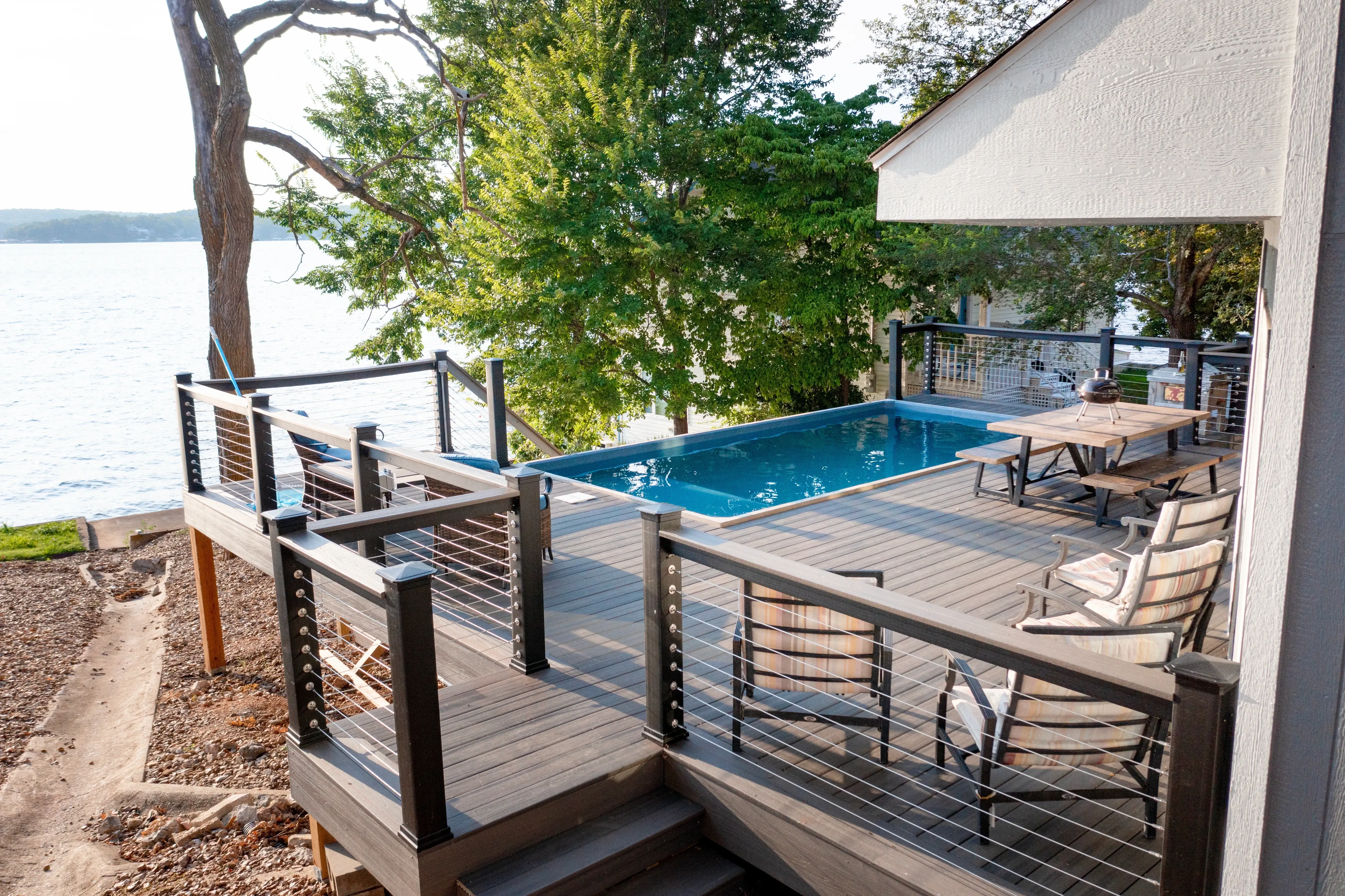 Plungie pool detail with modern coping and planted surround