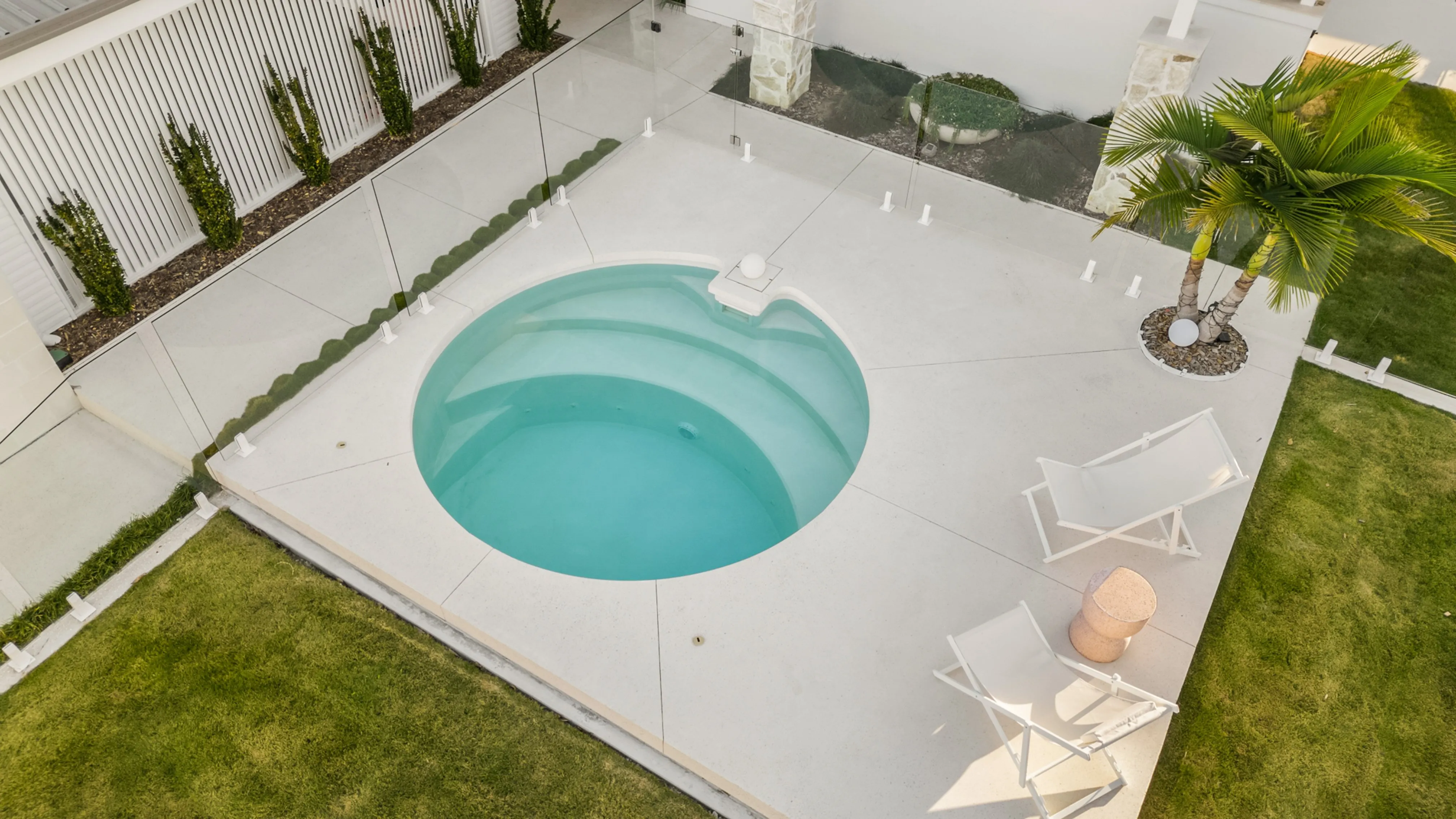 Plungie pool with coastal-style landscape treatment